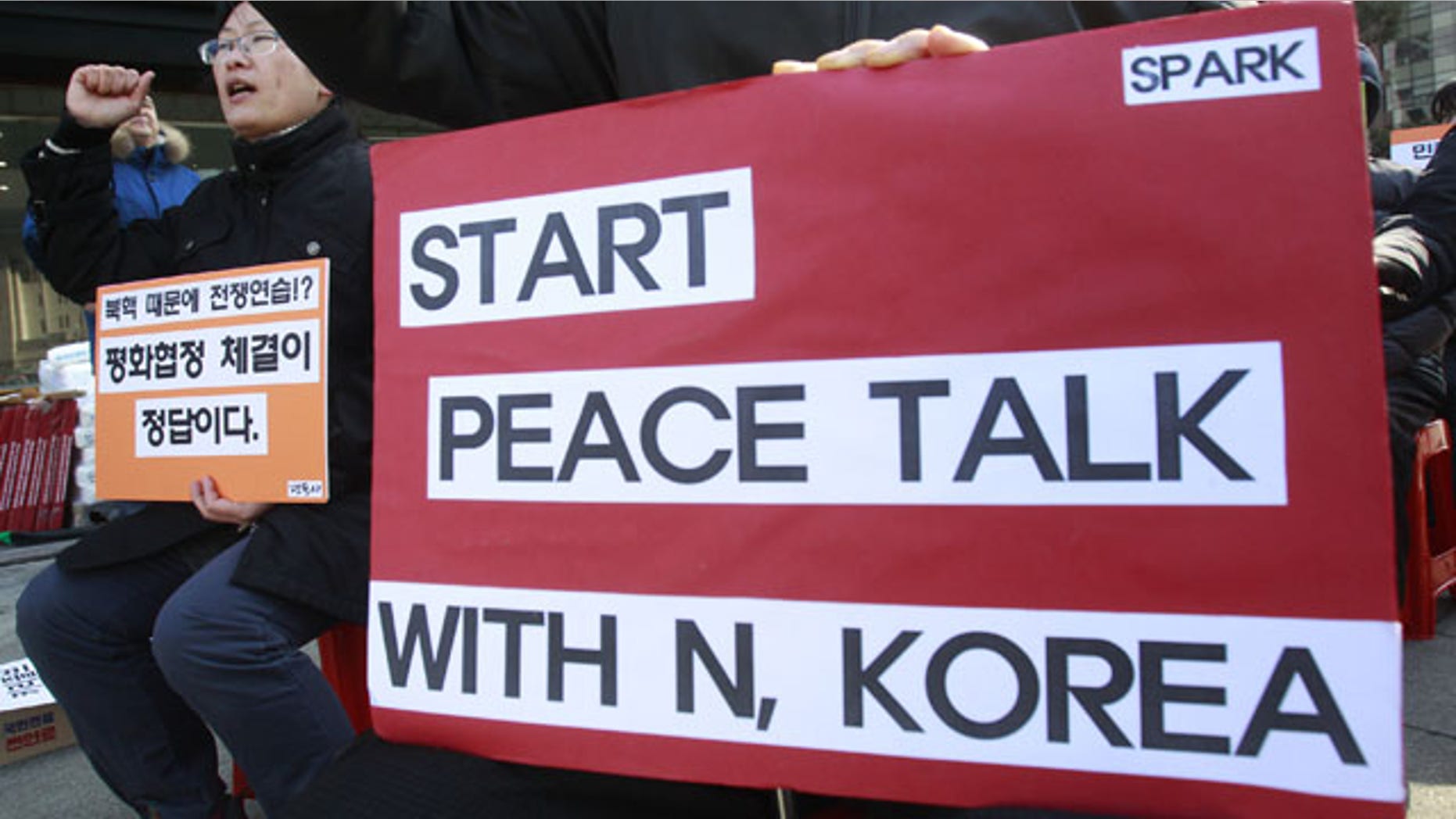 February 11, 2014: A protester shouts slogans during a rally opposing the scheduled visit of Secretary of State John Kerry near the U.S. embassy in Seoul, South Korea. Kerry will visit South Korea on Thursday to discuss issues of mutual concerns, including efforts to denuclearize North Korea.(AP Photo/Ahn Young-joon)