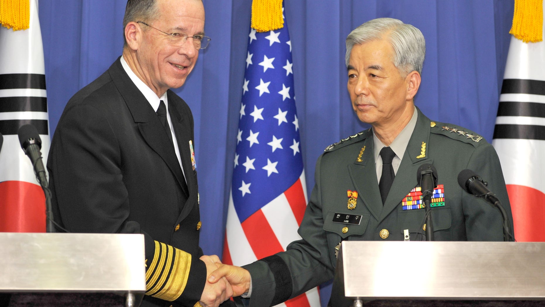 Dec. 8: Adm. Mike Mullen and South Korean Gen. Han Min-Koo shake hands after their joint press conference at the Defense ministry in Seoul. On Dec. 13 Mullen said that the danger of war or hostilities on the Korean peninsula is rising.