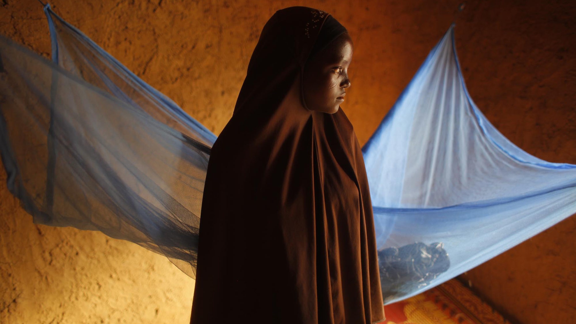 July 18, 2012 - FILE photo of Zali Idy, 12, posing in her bedroom in the remote village of Hawkantaki, Niger. Zali was married in 2011.