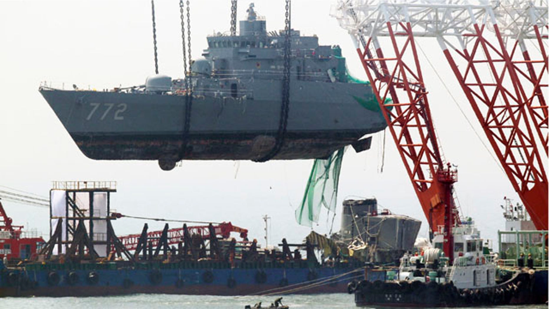 April 24: A giant offshore crane salvages bow section of the sunken South Korean naval ship off Baengnyeong Island, South Korea.