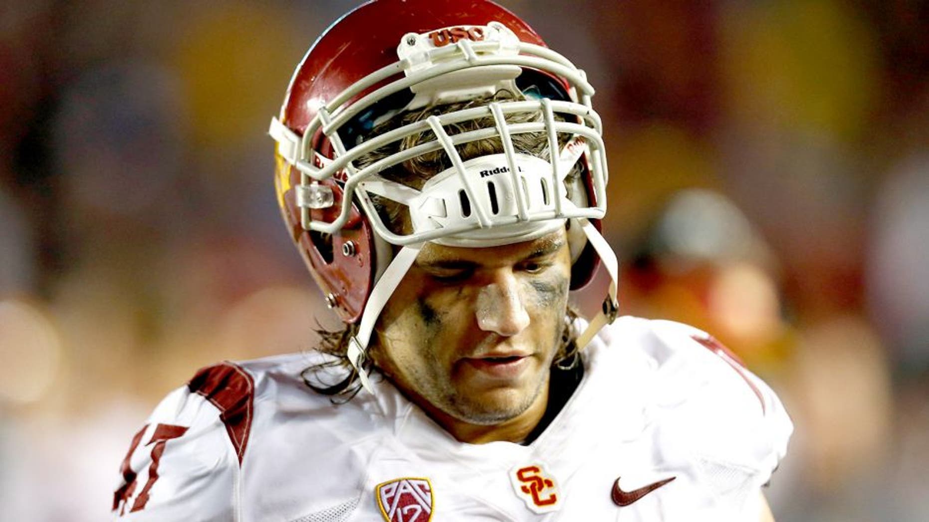Sep 13, 2014; Boston, MA, USA; Southern California Trojans line backer Scott Felix (47) on the sideline dejected during the fourth quarter against the Boston College Eagles at Alumni Stadium. The Boston College Eagles won 37-31. Mandatory Credit: Greg M. Cooper-USA TODAY Sports