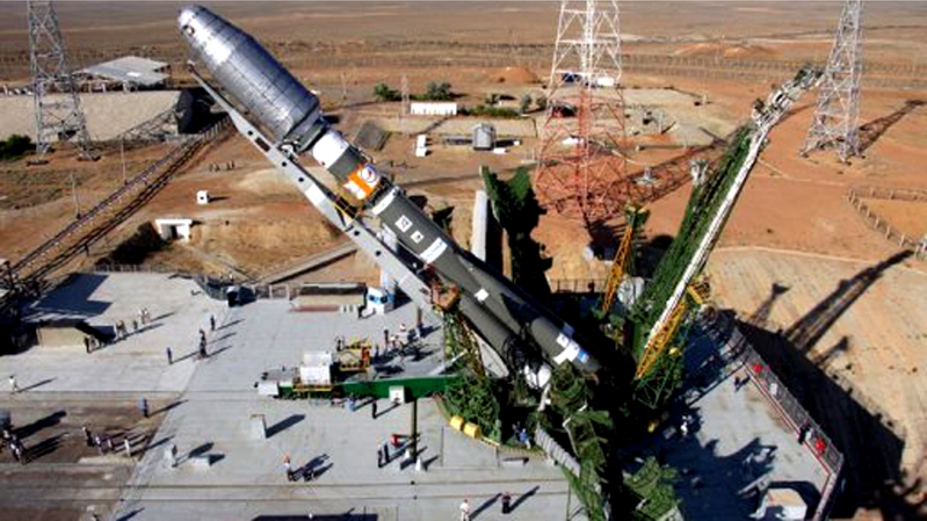 July, 2011: A Soyuz rocket is erected on the launch pad of the Baikonur cosmodrome. Moscow declared it was now "the era of the Soyuz" after the US shuttle's last flight left the Russian system as the sole means for delivering astronauts to the International Space Station.