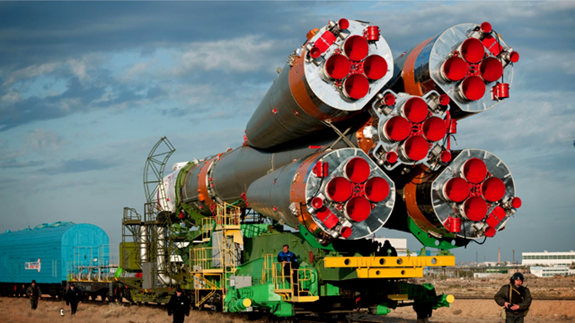 A Soyuz spacecraft is rolled out by train to the launch pad at the Baikonur Cosmodrome, Kazakhstan, on Oct. 5, 2010.