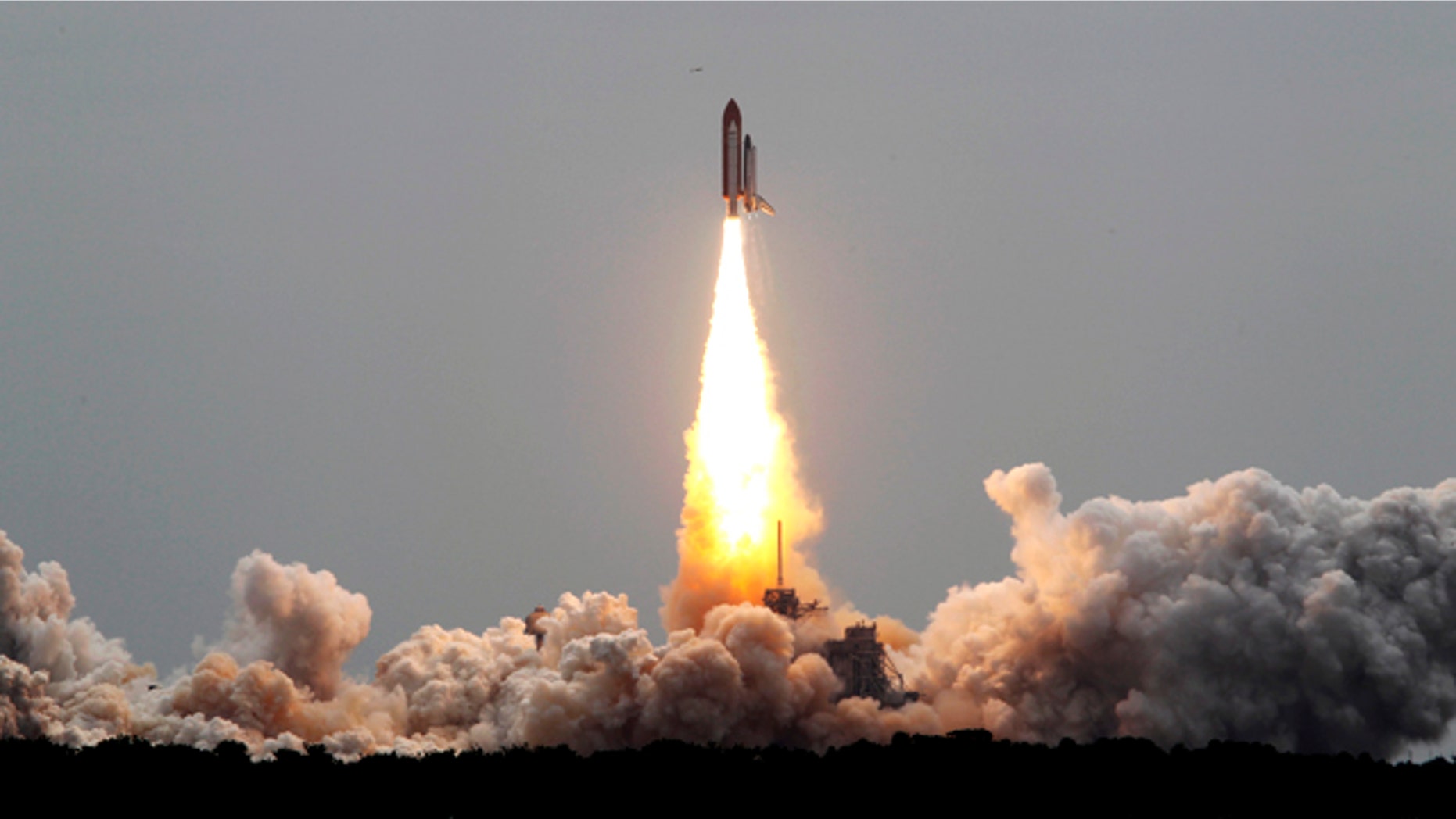 The space shuttle Atlantis lifts off from the Kennedy Space Center Friday, July 8, 2011, in Cape Canaveral, Fla. Atlantis is the 135th and final space shuttle launch for NASA.