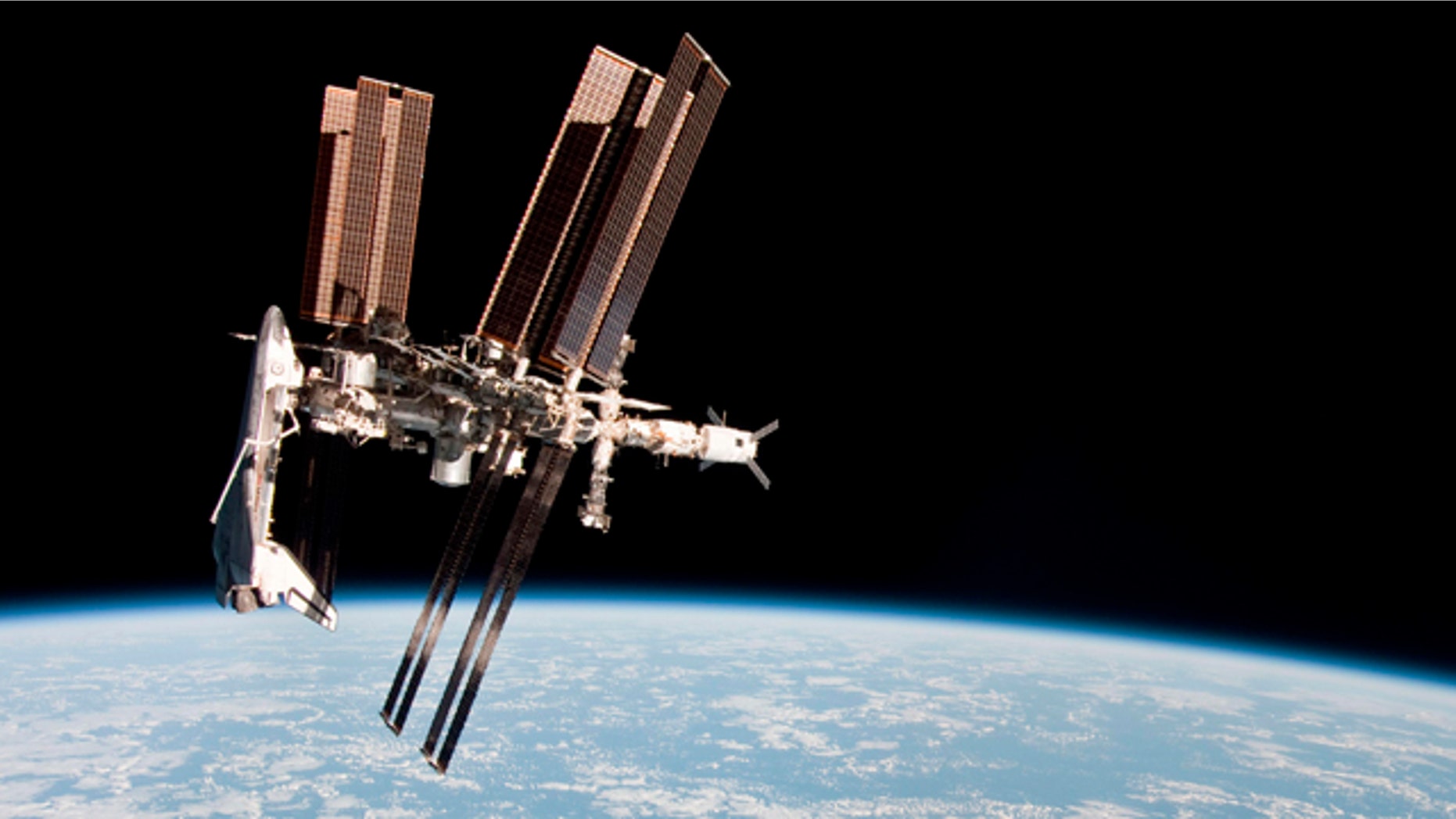 May 23, 2011: The International Space Station and the docked space shuttle Endeavour, left, at an altitude of approximately 220 miles.