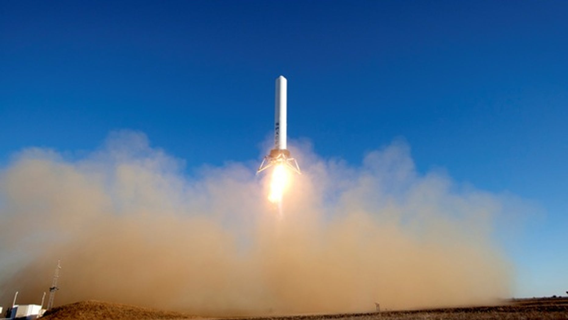 The SpaceX Grasshopper rocket prototype vertically launched and landed in its most impressive test flight to date on Dec. 17.