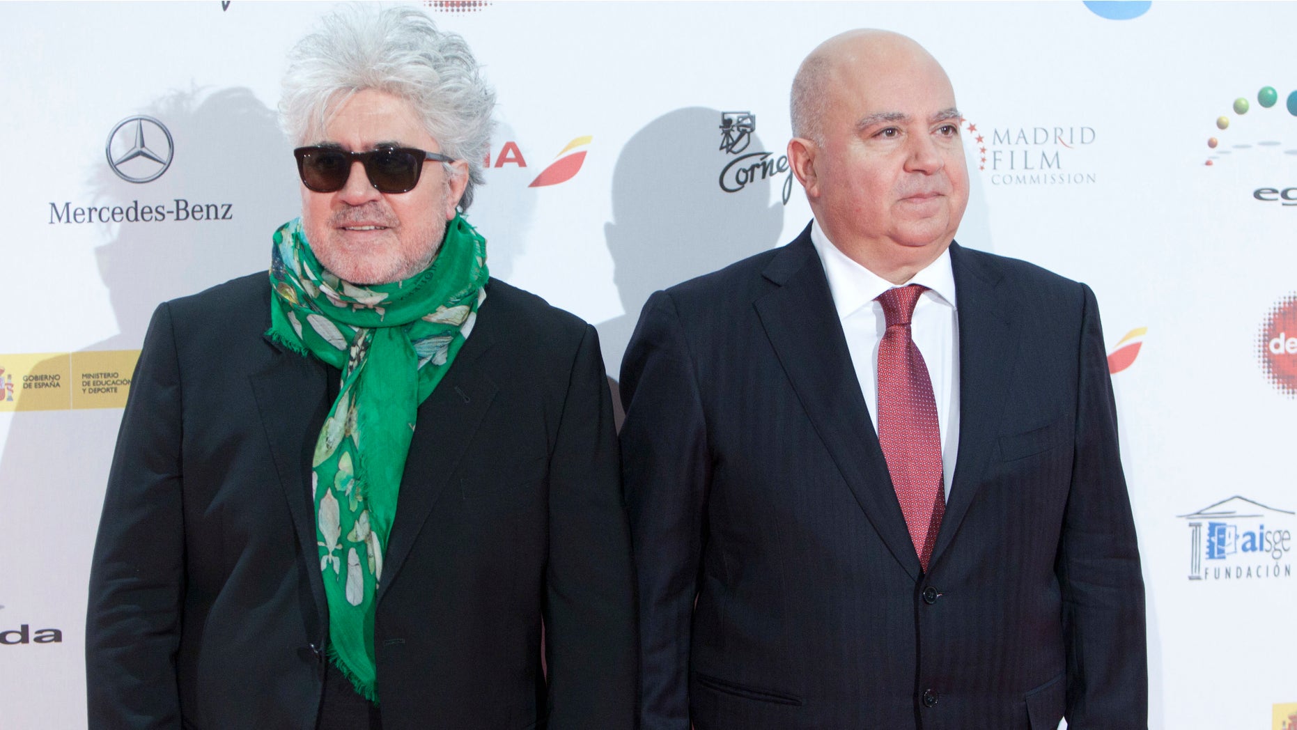 FILE - In this Monday Jan. 13, 2014 file photo, Spanish director Pedro Almodovar, left, and his brother the producer Agustin Almodovar poses for photographers during the photocall of the Jose Maria Forque Awards in Madrid, Spain. Agustin Almodovar said Monday, April 4, 2016, that he is blaming his lack of experience for a decision to set up an offshore company aimed at expanding their international film business in the 1990s. (AP Photo/Abraham Caro Marin, File)