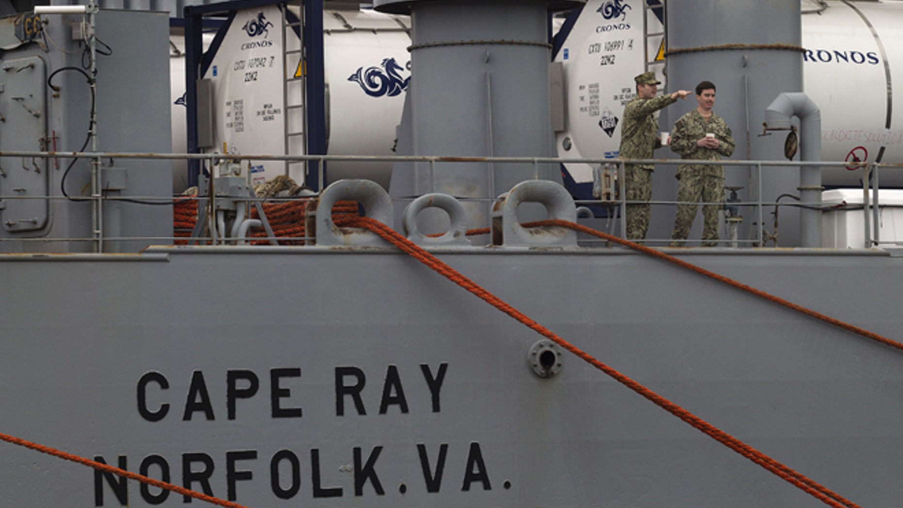 U.S. military personnel stand on the deck of American ship MV Cape Ray as it is docked at Naval Station in Rota, Spain, on Thursday Feb. 13, 2014. The American ship arrived on Thursday at the naval base of Rota on Spains southwestern coast used by the U.S. to resupply ahead of an unprecedented mission to collect and destroy mustard gas, raw materials for sarin nerve gas and tons of other highly toxic chemicals that form part of Syrias chemical weapons program. After leaving Spain, the Cape Rays next port of call is expected to be Gioia Tauro in southern Italy, where experts from the Organization for the Prohibition of Chemical Weapons say it will take on board 560 metric tons of chemicals that have been transported from the Syrian port of Latakia in two cargo ships from Denmark and Norway. (AP Photo/Miguel Angel Morenatti)