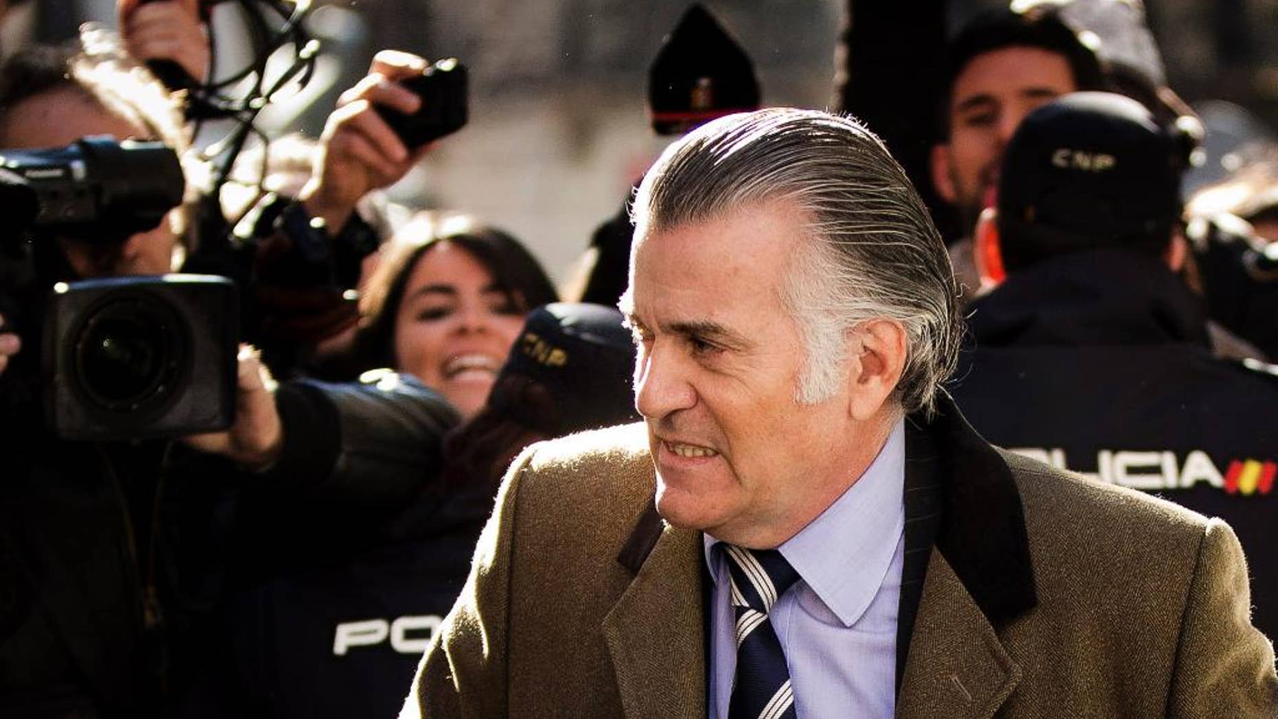 FILE - In this Feb. 6, 2013 file photo, former Popular Party treasurer Luis Barcenas arrives to the anti-corruption prosecuting office in Madrid. Bail has been set for a former ruling party finance chief jailed since 2013 amid accusations he ran a slush fund that benefited top party officials, including Spanish Prime Minister Mariano Rajoy. A National Court statement said Tuesday, Jan. 20, 2015 that judges set bail for Luis Barcenas at euro 200,000 ($232,000) after previously denying his requests because he had been considered a flight risk. Barcenas has said he made regular payoffs to Popular Party officials including Rajoy. The prime minister and the party deny his claims. (AP Photo/Daniel Ochoa de Olza, File)