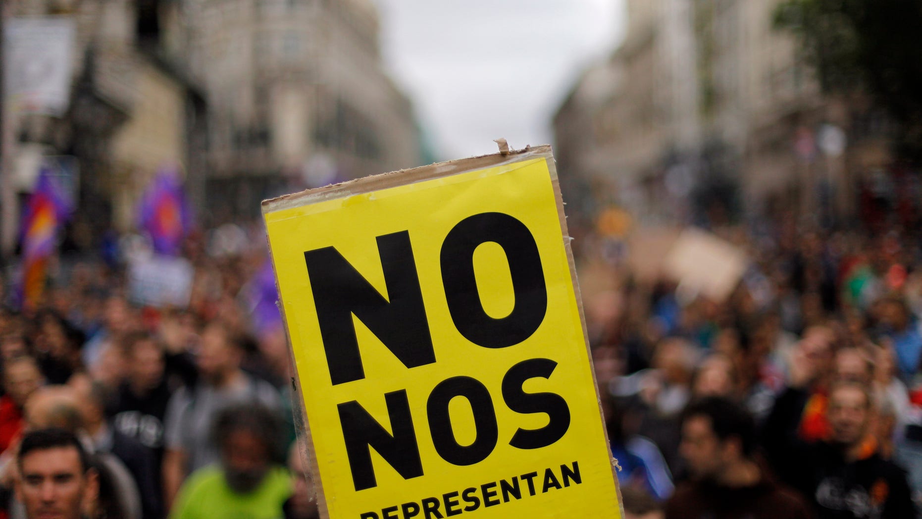 Sept. 25, 2012: Protestors hold a banner reading "you don't represent us" during a demonstration against austerity measures announced by the Spanish government in Madrid, Spain.