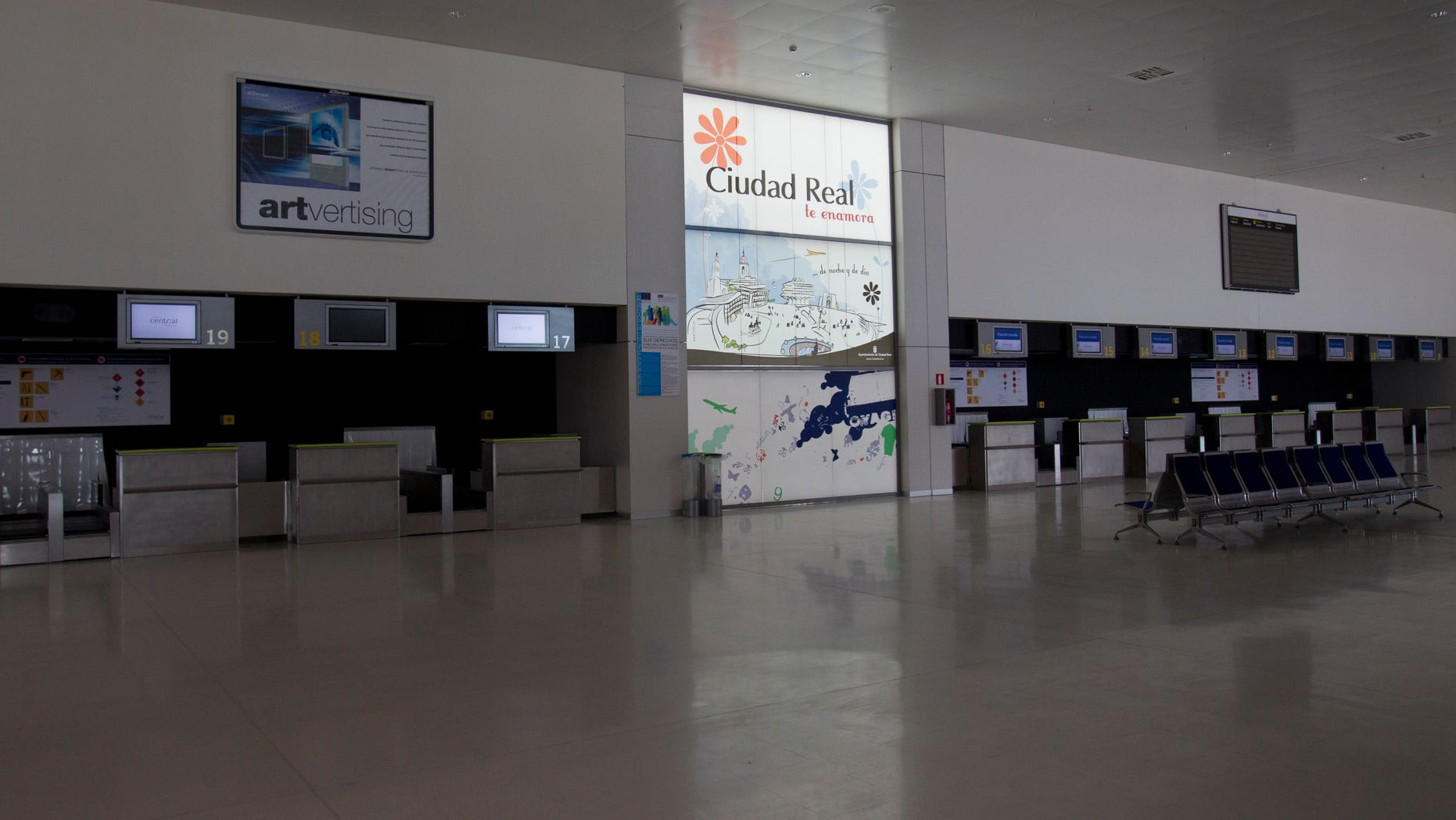 Check-in desks stand empty at the Central airport in Ciudad Real, Spain.