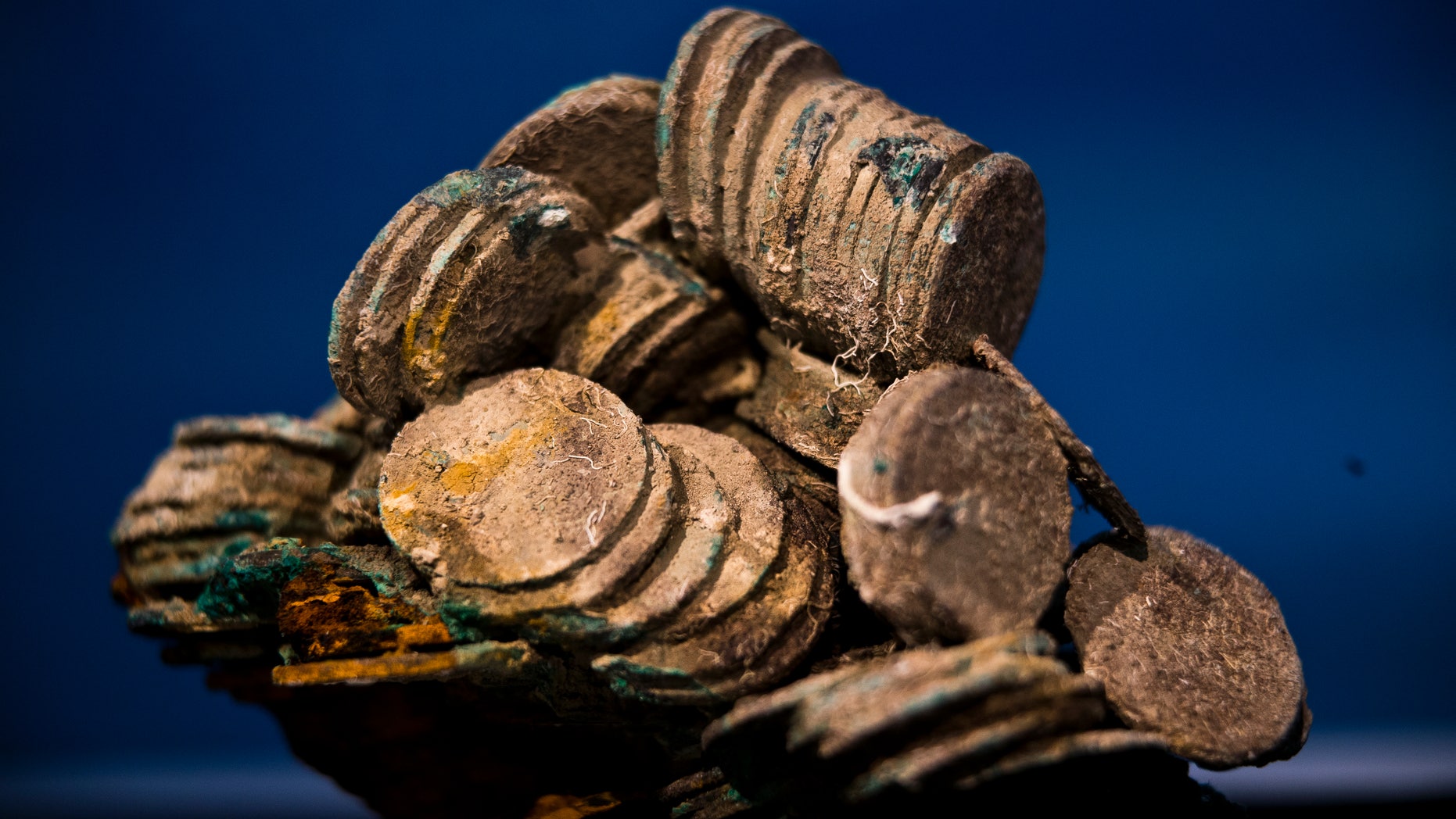 A block of encrusted silver coins from the shipwreck of a 1804 galleon, on its first display to the media at a Ministry building, in Madrid, Friday, Nov. 30, 2012. Spanish cultural officials have allowed the first peep at 16 tons (14.5 metric tons) of the shipwreck, 'Nuestra Senora de las Mercedes' a treasure worth an estimated $500 million that a U.S. salvage company gave up after a five-year international ownership dispute. (AP Photo/Daniel Ochoa de Olza)