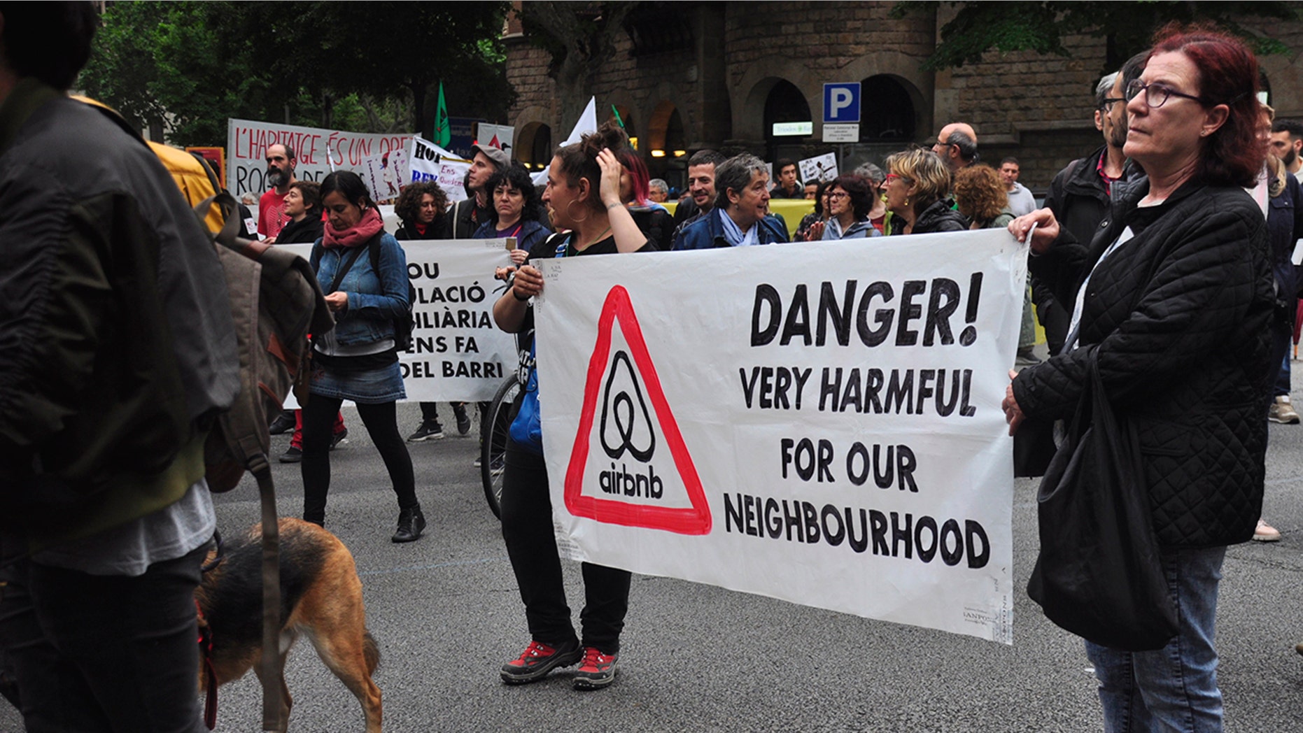Locals hold a banner during the demonstration 'Barcelona no está en venta' (Barcelona is not for sale) against tourism and gentrification. Locals say they have to move to other cities due the increasing rent prices.