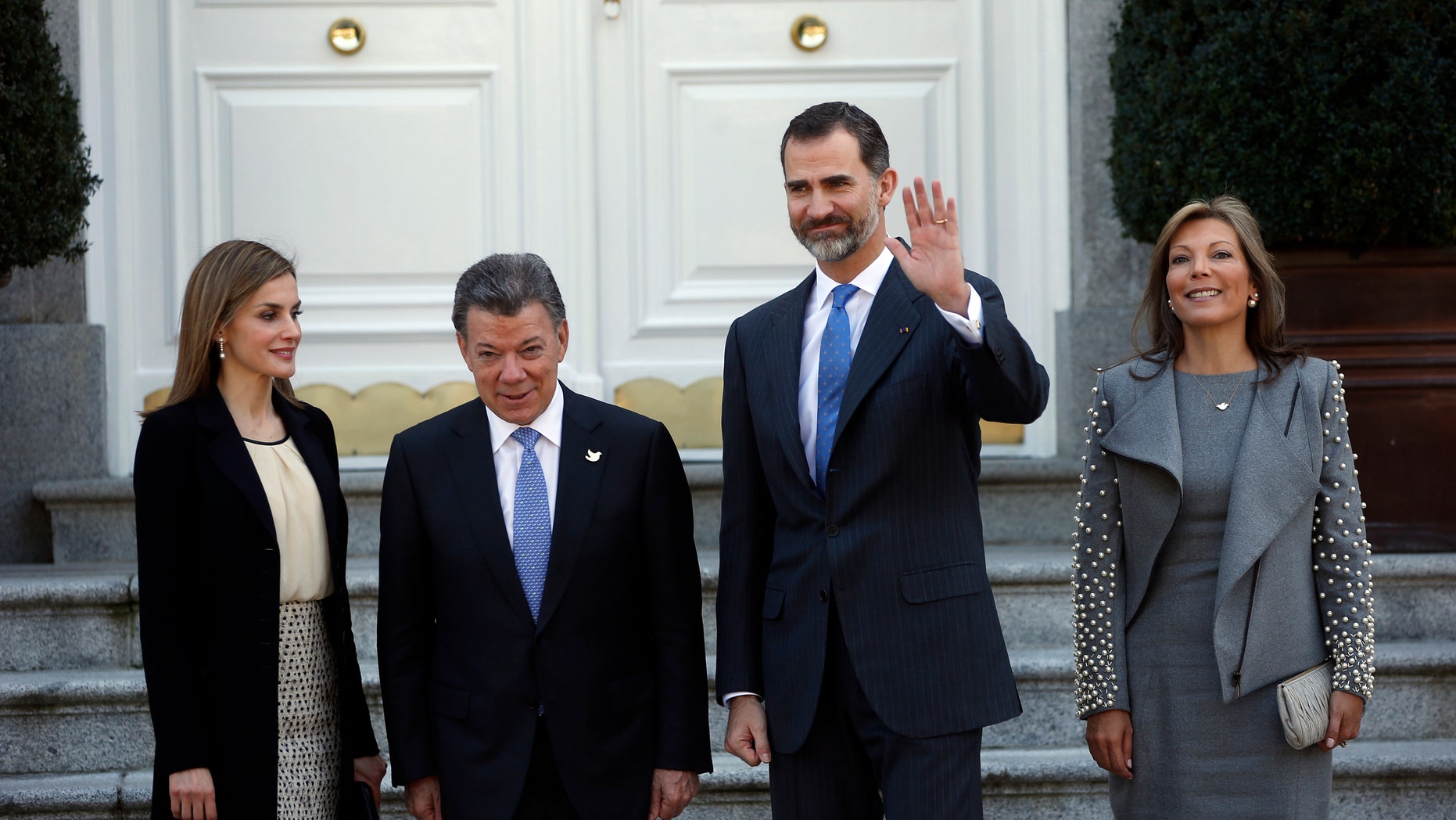 File photo - Spanish Queen Letizia (L-R), Colombian President Juan Manuel Santos, Spanish King Felipe and Colombian First Lady Maria Clemencia Rodriguez pose before a luncheon at Zarzuela Palace outside Madrid March 1, 2015.