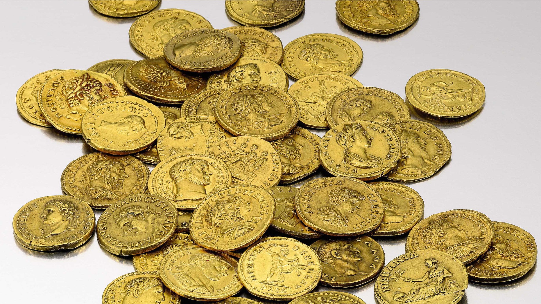 This undated photo provided by Sotheby's showssome gold coins from the 37,895 piece Archer M. Huntington Collection, that will be auctioned by Sotheby's in New York. The collection Spanish coins dating back to the ancient world is expected to realize between $25/35 million, and will be on public exhibition in its entirety during February 2012. (AP Photo/Sotheby's)