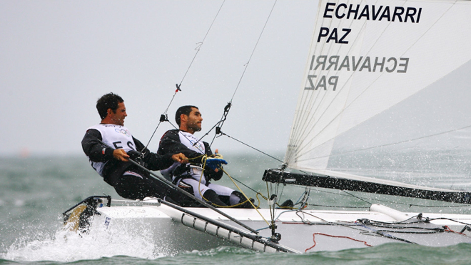 Anton Paz and Fernando Echavarri of Spain compete on their way to winning the Tornado class event held at the Qingdao Olympic Sailing Center during day 13 of the Beijing 2008 Olympic Games on August 21, 2008 in Qingdao, China. (Photo by Clive Mason/Getty Images)