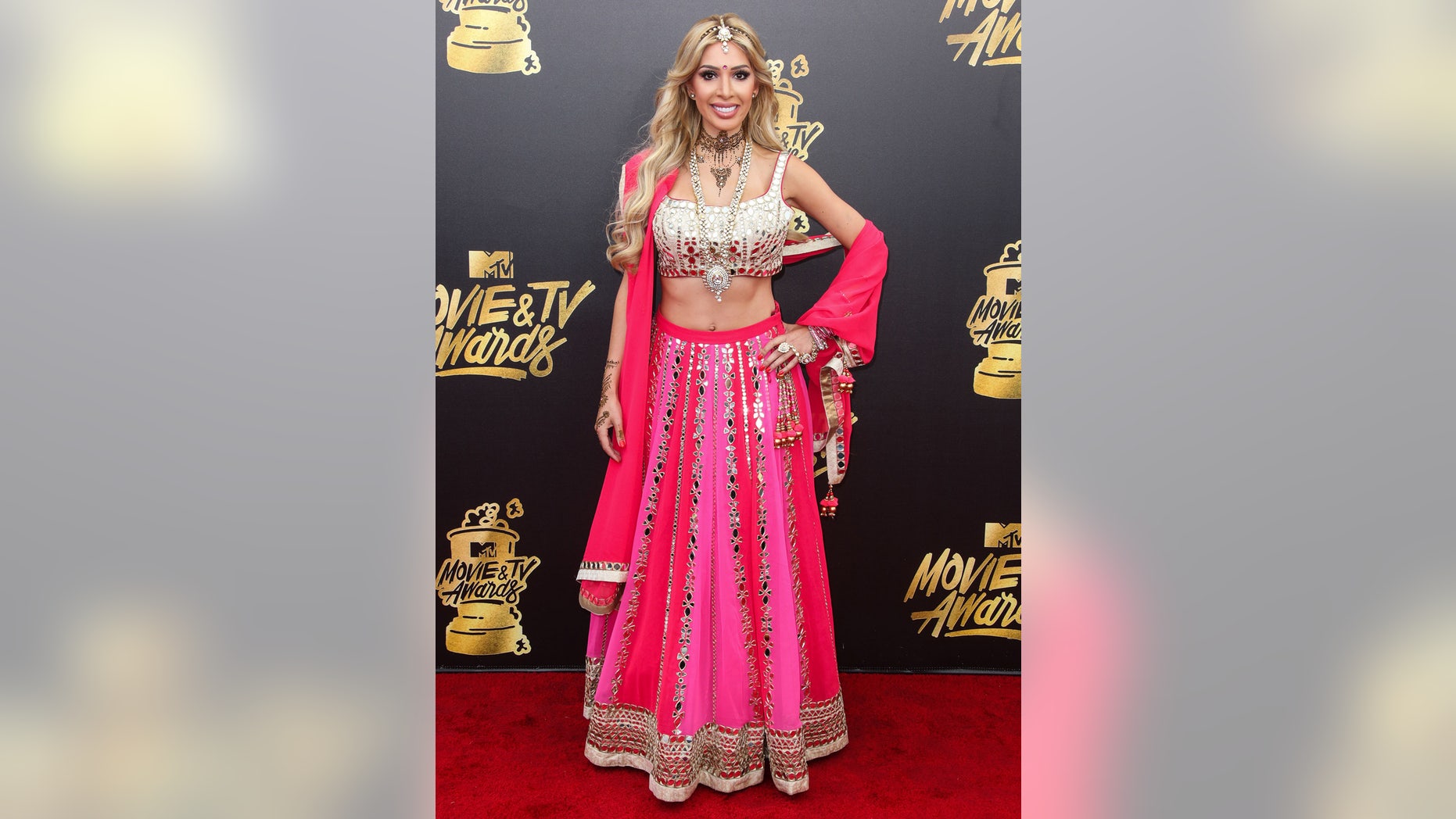 "Teen Mom OG" star Farrah Abraham arrived at the 2017 MTV Movie and TV Awards wearing a Bollywood-inspired dress.