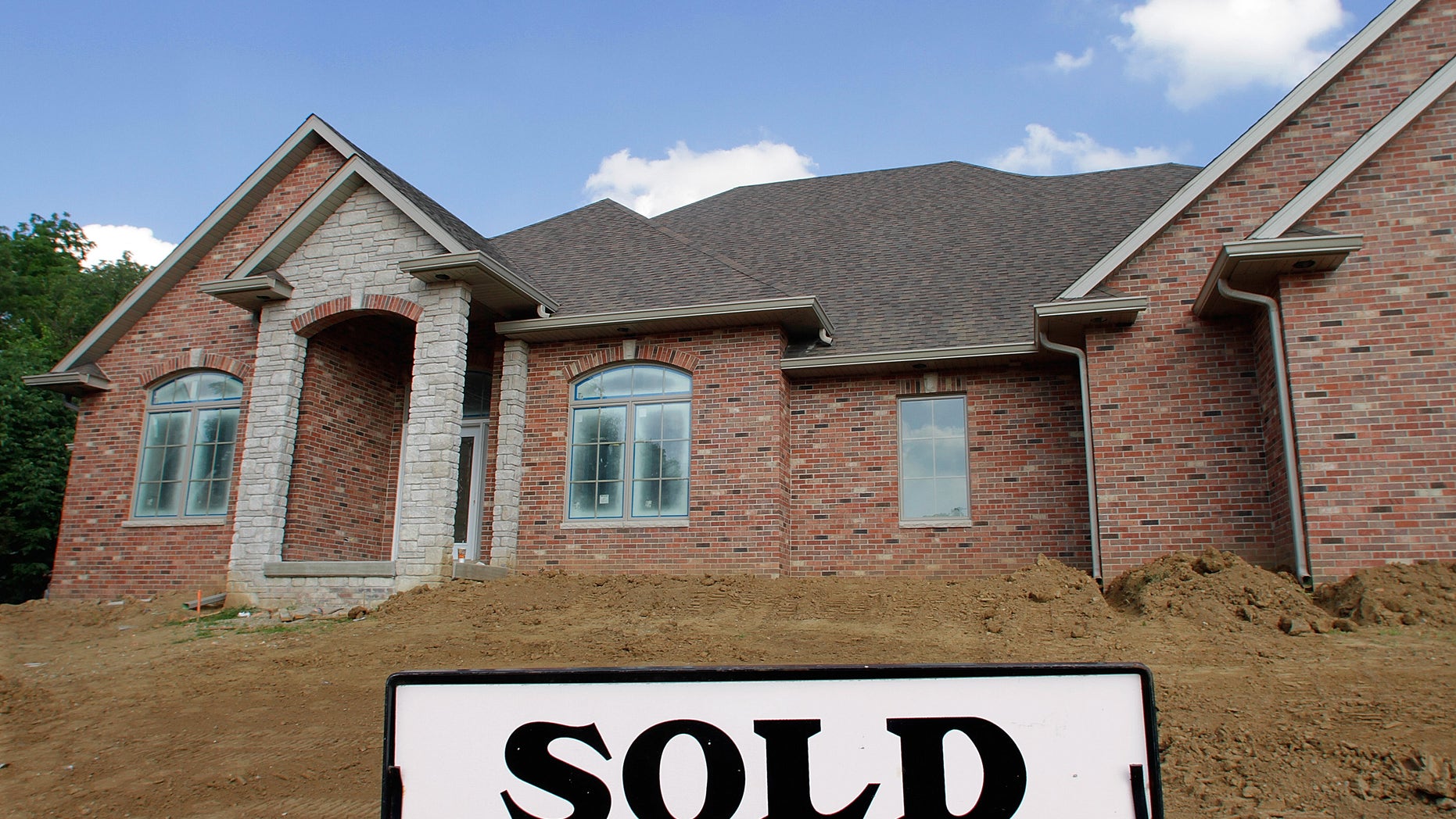 July 14: A newly constructed home which was recently sold, is shown in Springfield, Ill. Home prices in major U.S. cities rose for the second straight month in May.