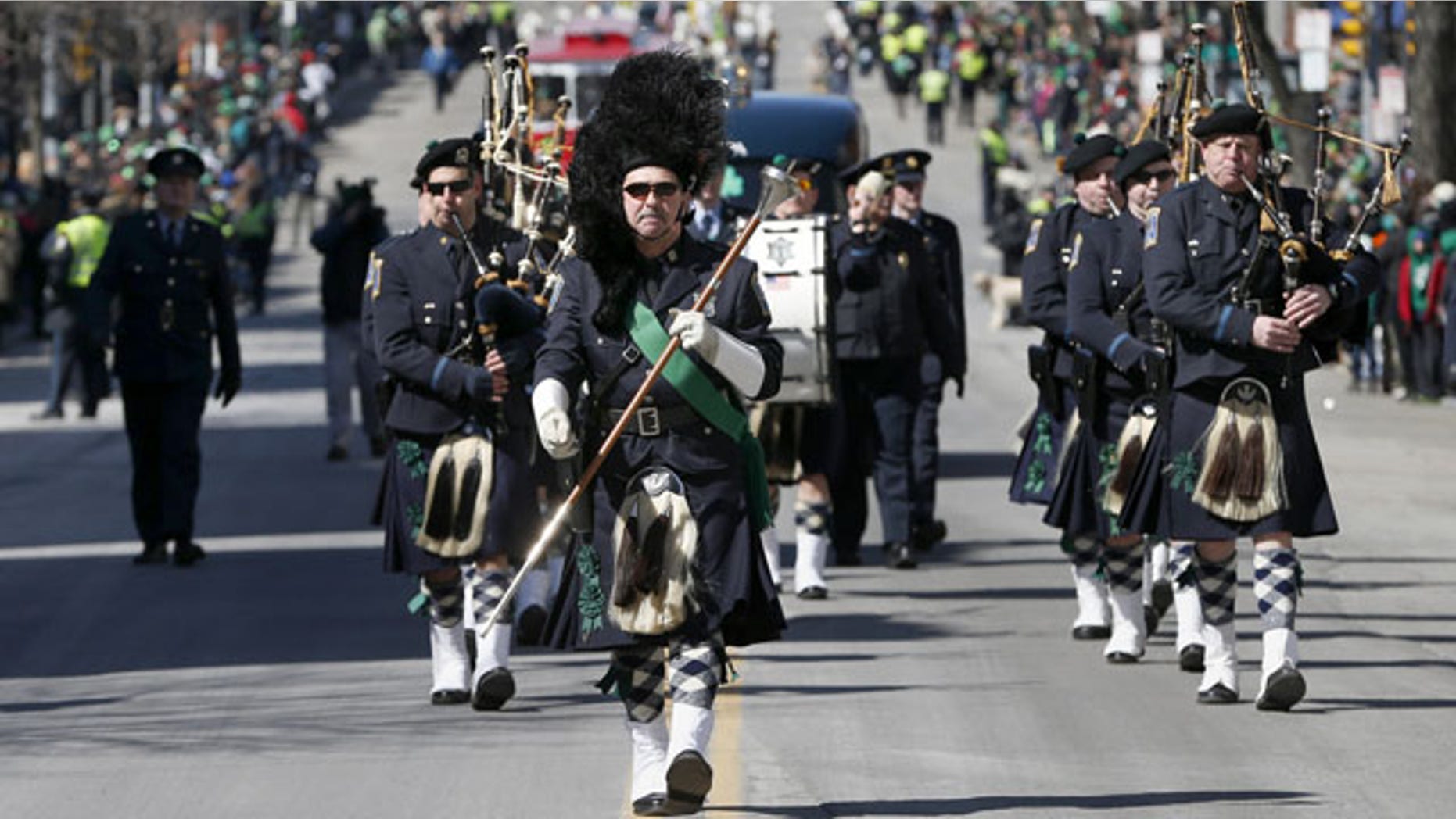 March 16, 2014: The Boston Police Gaelic Column marches in the annual St. Patrick's Day parade in the South Boston neighborhood of Boston. (AP Photo/Michael Dwyer)