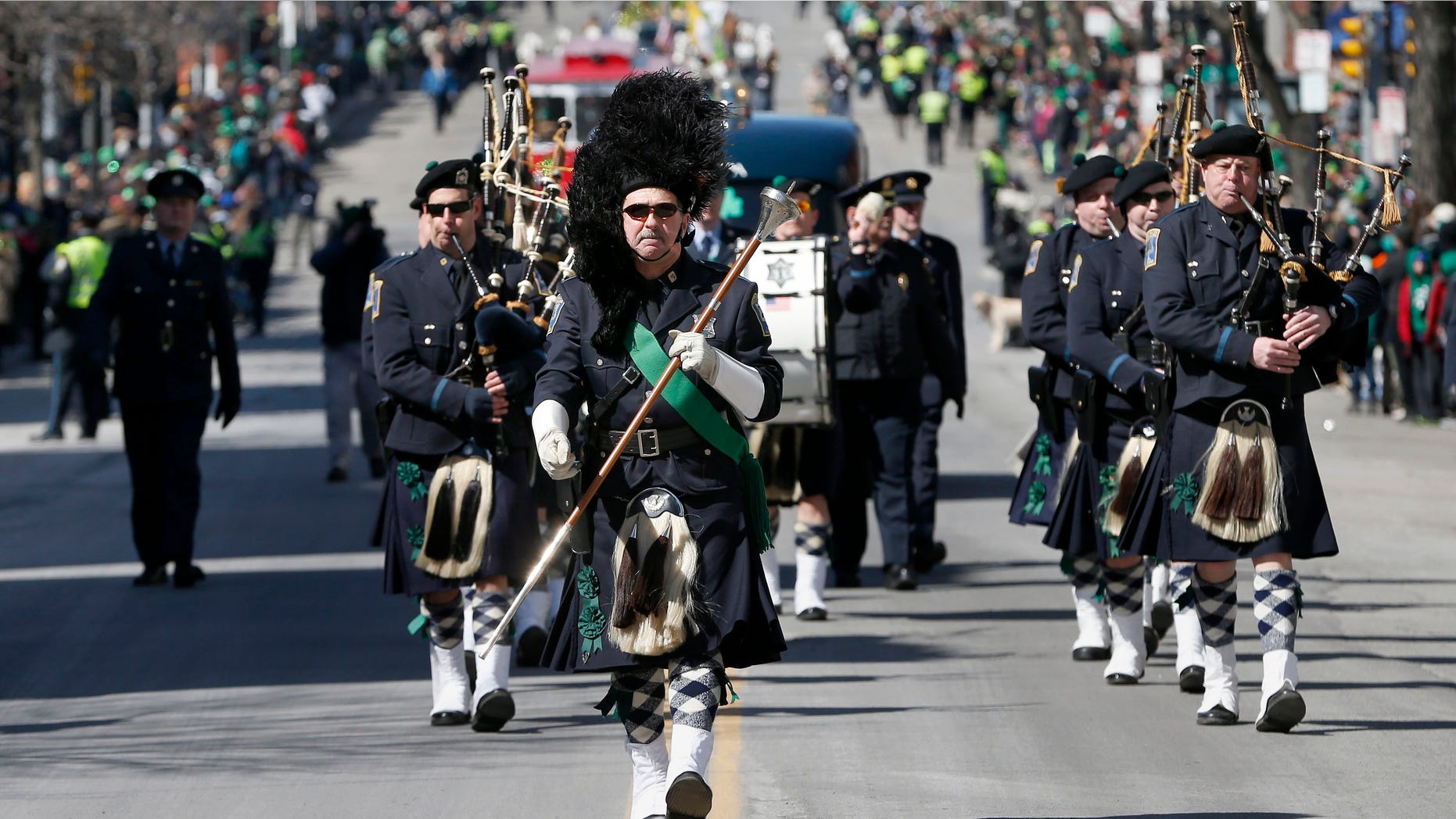 The Boston Police Gaelic Column marches in the annual St. Patrick's Day parade in the South Boston neighborhood of Boston, Sunday, March 16, 2014.