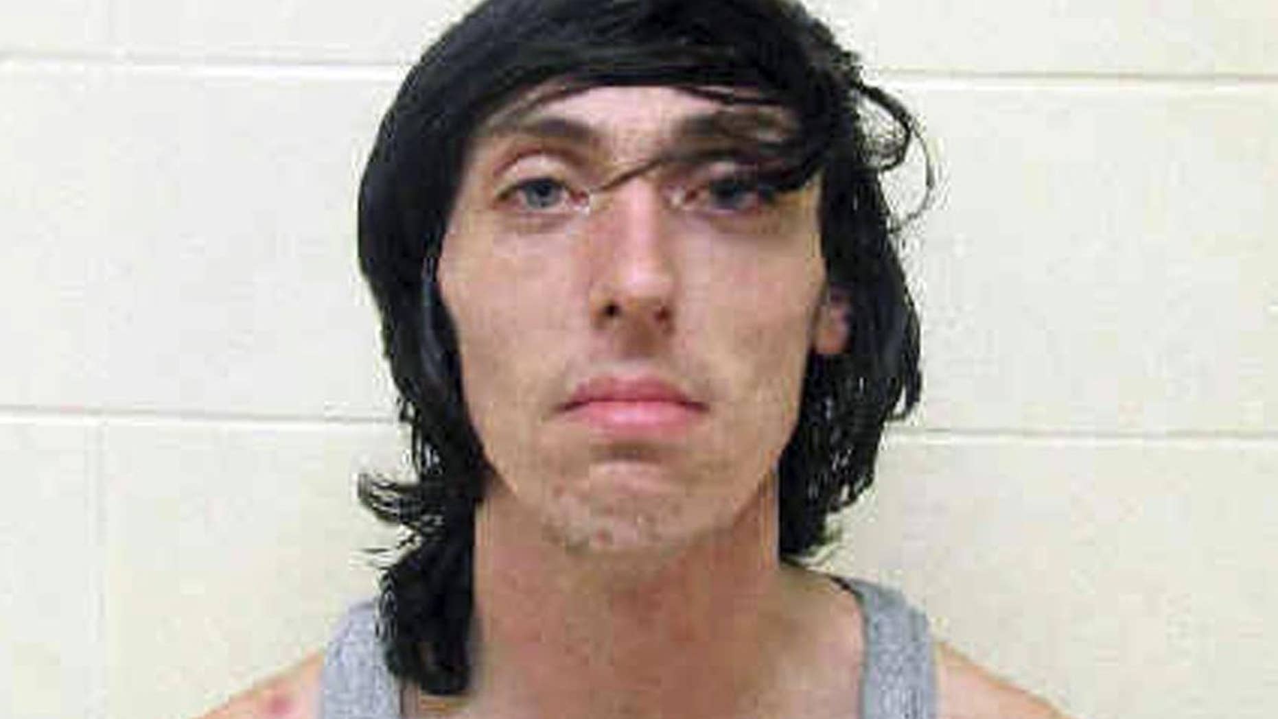 This booking photo released Monday, Aug. 24, 2015, by the Scioto County Jail in Portsmouth, Ohio, shows Kevin Blakemore, 21, arrested Sunday, Aug. 23, 2015, in Pike County, Ohio, on escape and theft charges. Massachusetts authorities said Blakemore began a crime spree on in Boxborough, Mass., Thursday when Massachusetts authorities say he allegedly stabbed a relative a male relative, assaulted a woman, and forced both into a car that he drove to Ohio. (Scioto County Jail via AP)