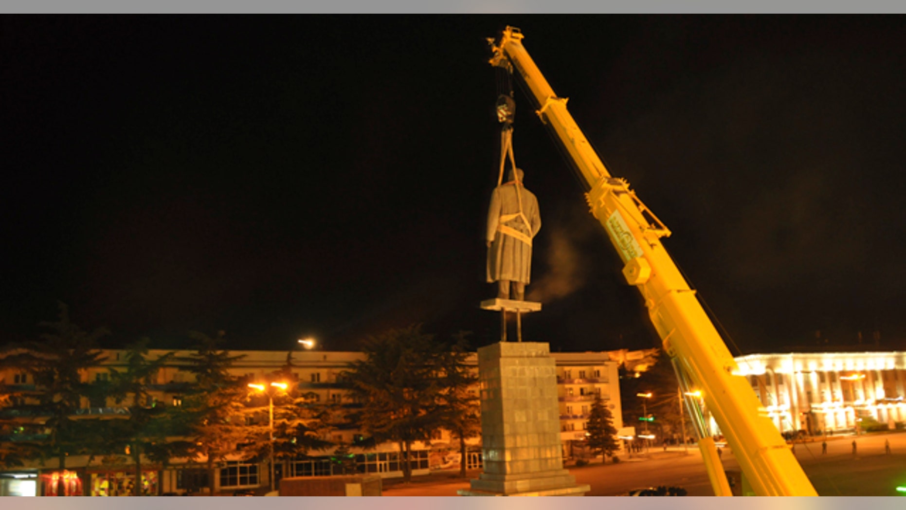 June 25: In this photo released by Gori region administration a statue of Soviet dictator Josef Stalin is dismantled at his home town of Gori, 80 kms (50 miles) west of the Georgian capital Tbilisi. Authorities in Georgia have torn down a monument to Soviet dictator Josef Stalin in his birthplace of Gori to make way for a memorial to the fallen in the Russian-Georgian war of 2008. (AP)