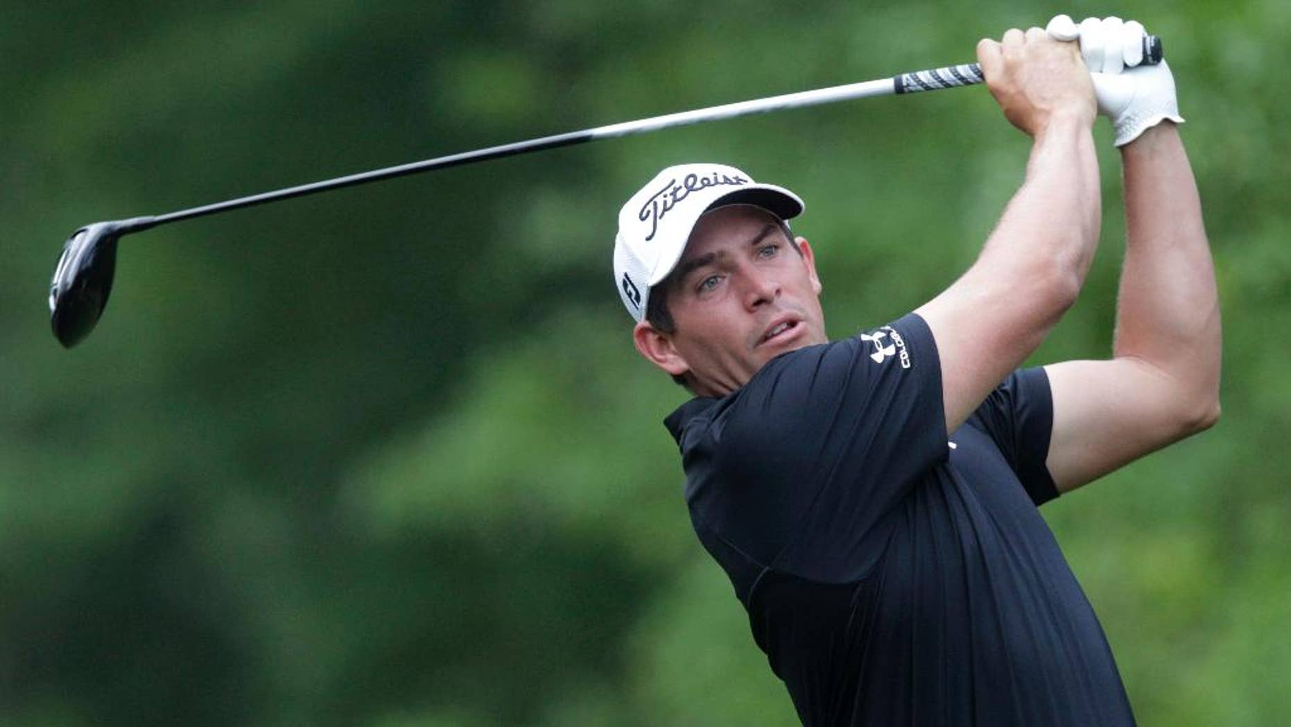 FILE - In an April 2, 2015, file photo Scott Stallings watches his tee shot on the second hole at the Houston Open golf tournament in Humble, Texas. Stallings has been suspended for three months for violating the PGA Tour's anti-doping policy.(AP Photo/Patric Schneider, file)
