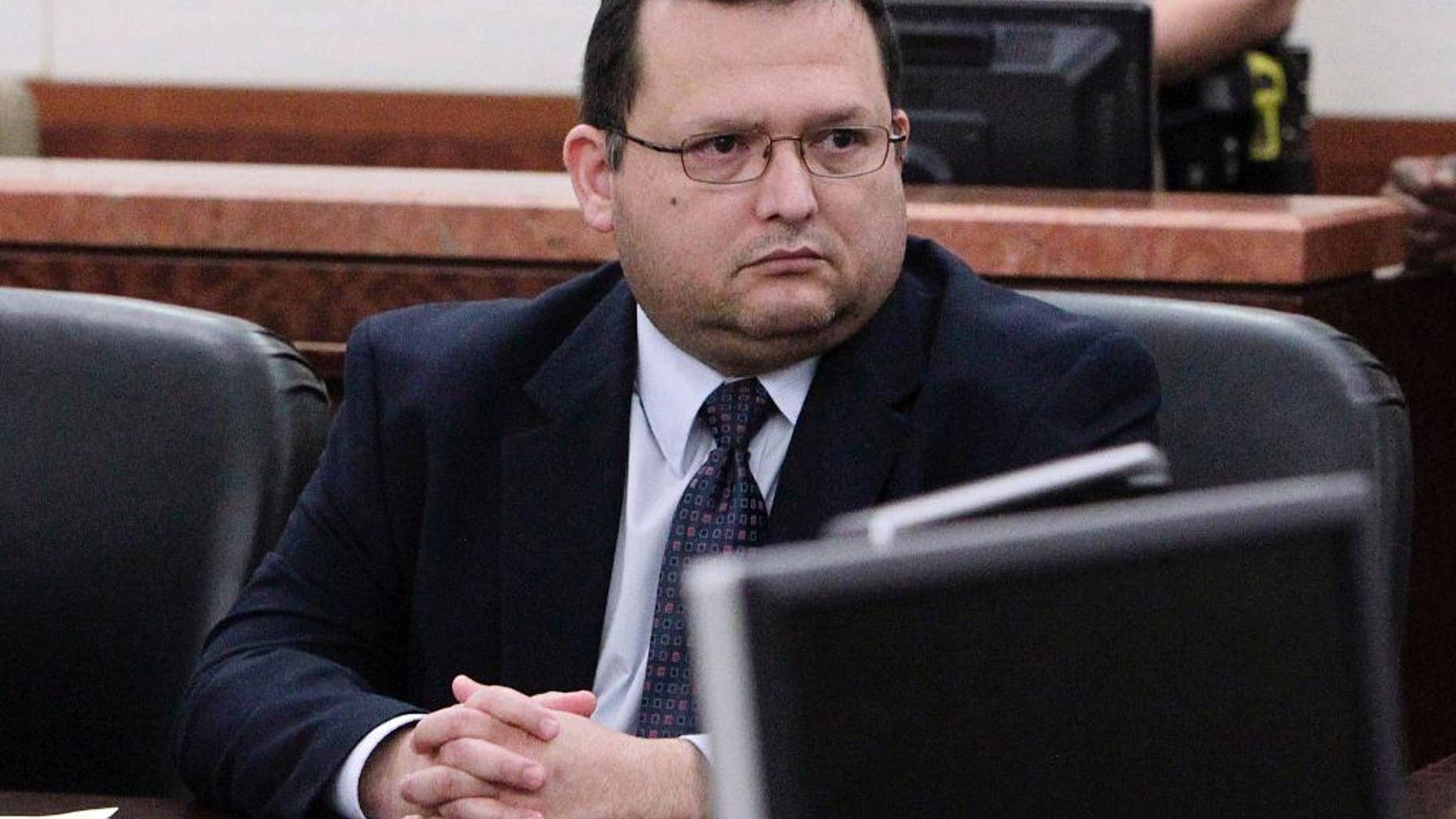 FILE - In this June 27, 2012, file photo, Raul Rodriguez looks at the Danaher family and friends after hearing victim impact statements in the 178th State District Court at the Harris County Criminal Justice Center in Houston. A Texas appeals court has ruled Thursday, Dec. 18, 2014, that Rodriguez, convicted of murder after jurors rejected his "stand your ground" self-defense claim, didn't get a fair trial and deserves a new one. (AP Photo/Houston Chronicle, Mayra Beltran, File)