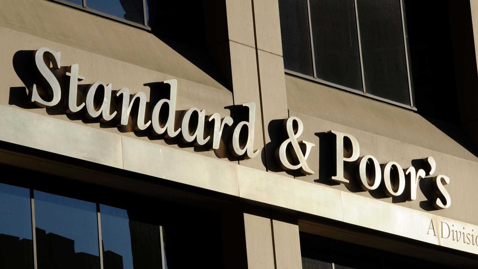 Oct. 9, 2011: File photo shows 55 Water Street, home of Standard & Poor's, in New York. S&P said Monday, Feb. 4, 2013, the U.S. government is expected to file civil charges against Standard & Poor's Ratings Services, alleging that it improperly gave high ratings to mortgage debt that later plunged in value and helped fuel the 2008 financial crisis.