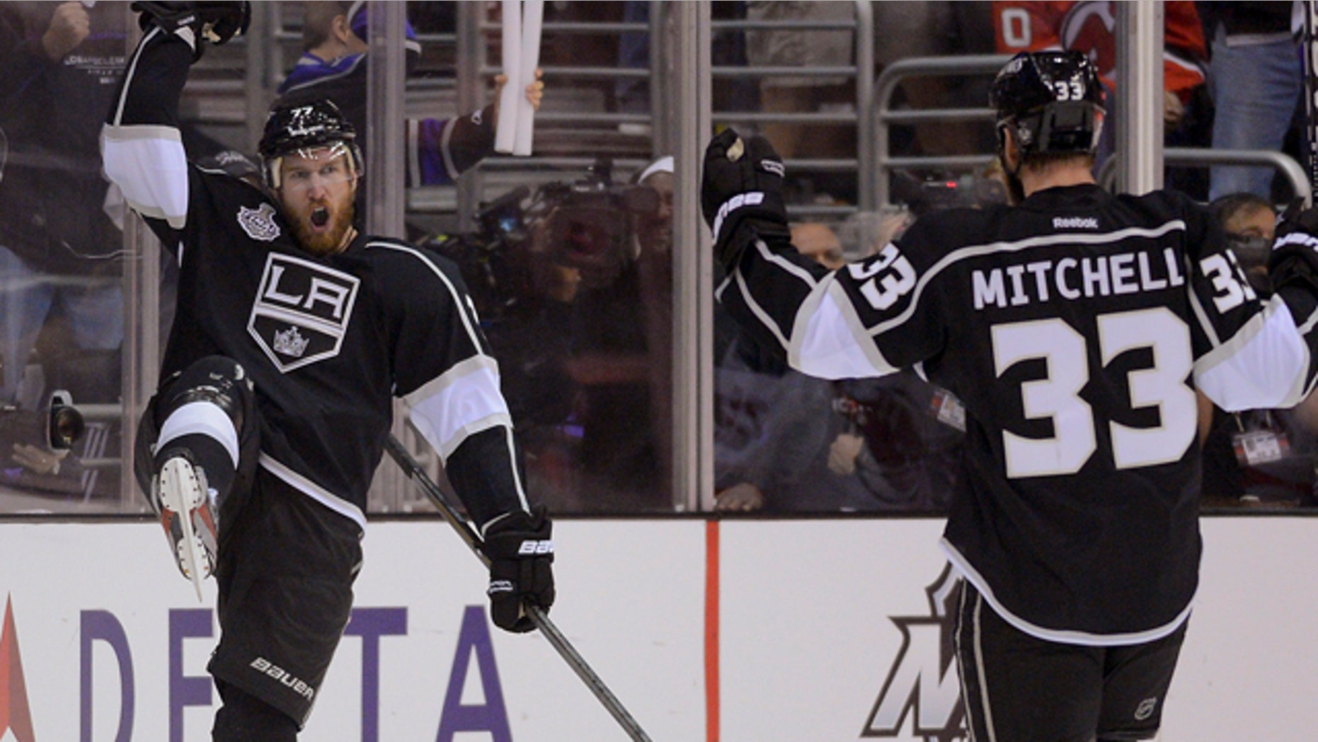 June 4, 2012: Los Angeles Kings center Jeff Carter (77) and Los Angeles Kings defenseman Willie Mitchell (33) react after Carter's third period goal against the New Jersey Devils.