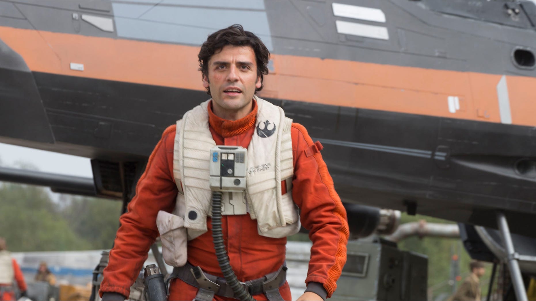This photo provided by Disney/Lucasfilm shows Oscar Isaac as Poe Dameron in a scene from "Star Wars: The Force Awakens," directed by J. J. Abrams. The new film releases in U.S. theaters on Dec. 18, 2015. (David James/Disney/Lucasfilm via AP)