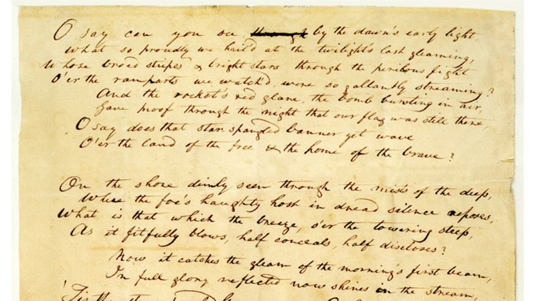 This undated handout image provided by The Maryland Historical Society shows the 1814 Star-Spangled Banner manuscript by Francis Scott Key. The original, handwritten manuscript of The Star-Spangled Banner and the flag that inspired the songs lyrics will be displayed together at the Smithsonian in Washington, what is believed to be the first time the historic pieces have been shown side-by-side, on Flag Day, June 14, through July 6.
