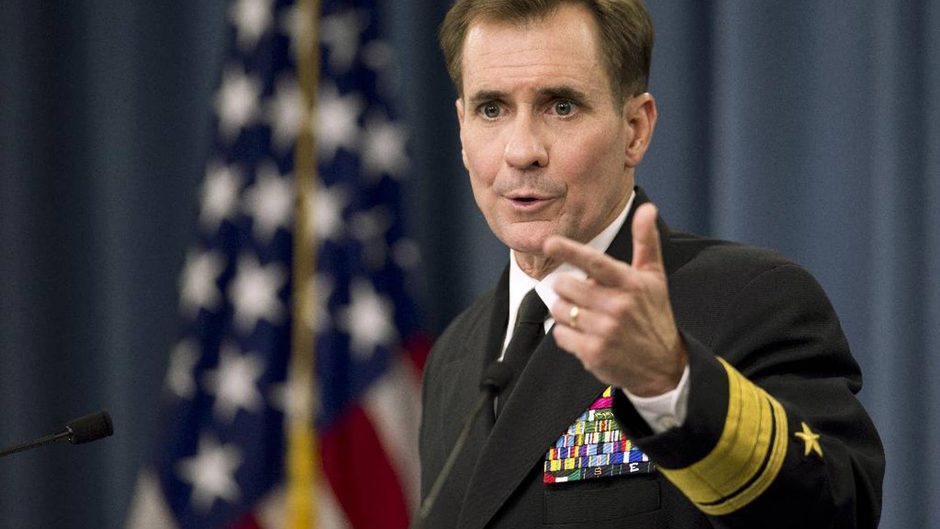 FILE - In this Nov. 7, 2014 file photo, Department of Defense Press Secretary Rear Admiral John Kirby, speaks to reporters during a news conference, at the Pentagon. U.S. officials say former Pentagon spokesman Admiral John Kirby will retire from the military and move to the State Department to be that agency's new public face. The officials say Secretary of State John Kerry tapped Kirby to be the department's spokesman. (AP Photo/Manuel Balce Ceneta)