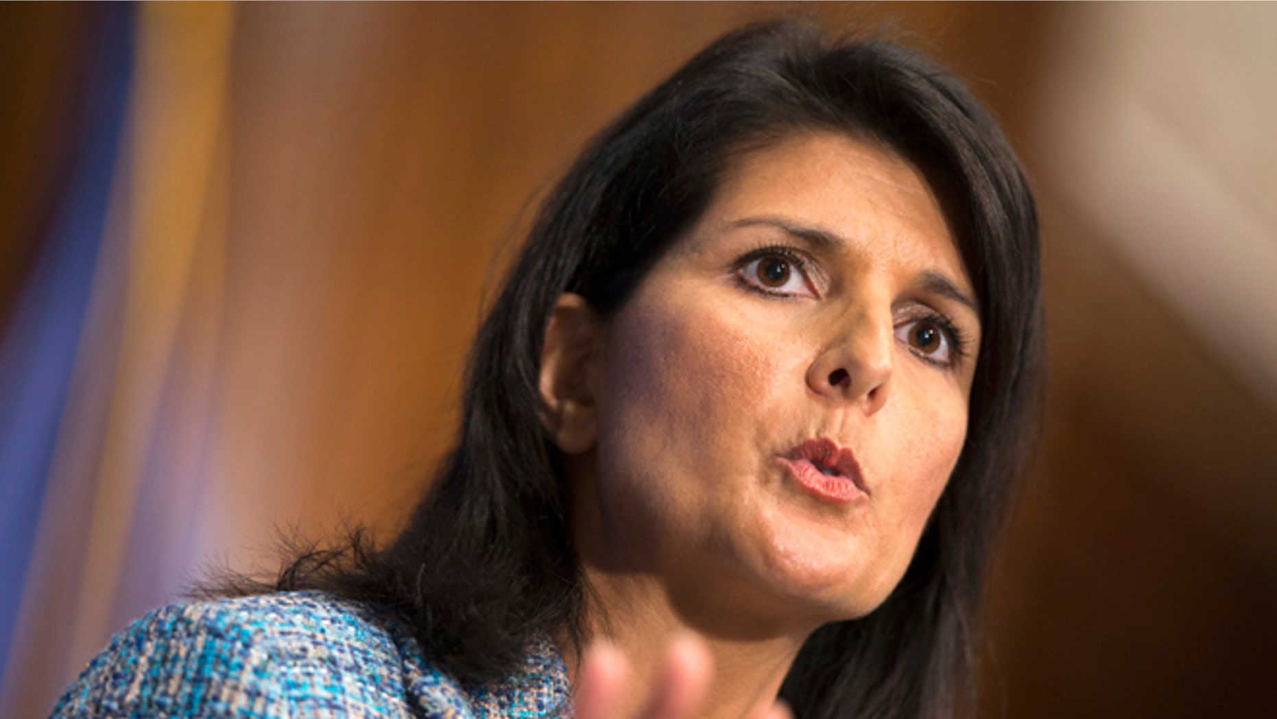 FILE - In this Sept. 2, 2015, photo. South Carolina Gov. Nikki Haley speaks at the National Press Club in Washington. Americans should resist "the siren call of the angriest voices" in how it treats immigrants, Haley said Jan. 12, 2016, as the GOP used its formal response to President Barack Obama's State of the Union address to try softening the tough stance embraced by some of the GOP's leading presidential candidates. (AP Photo/Evan Vucci)