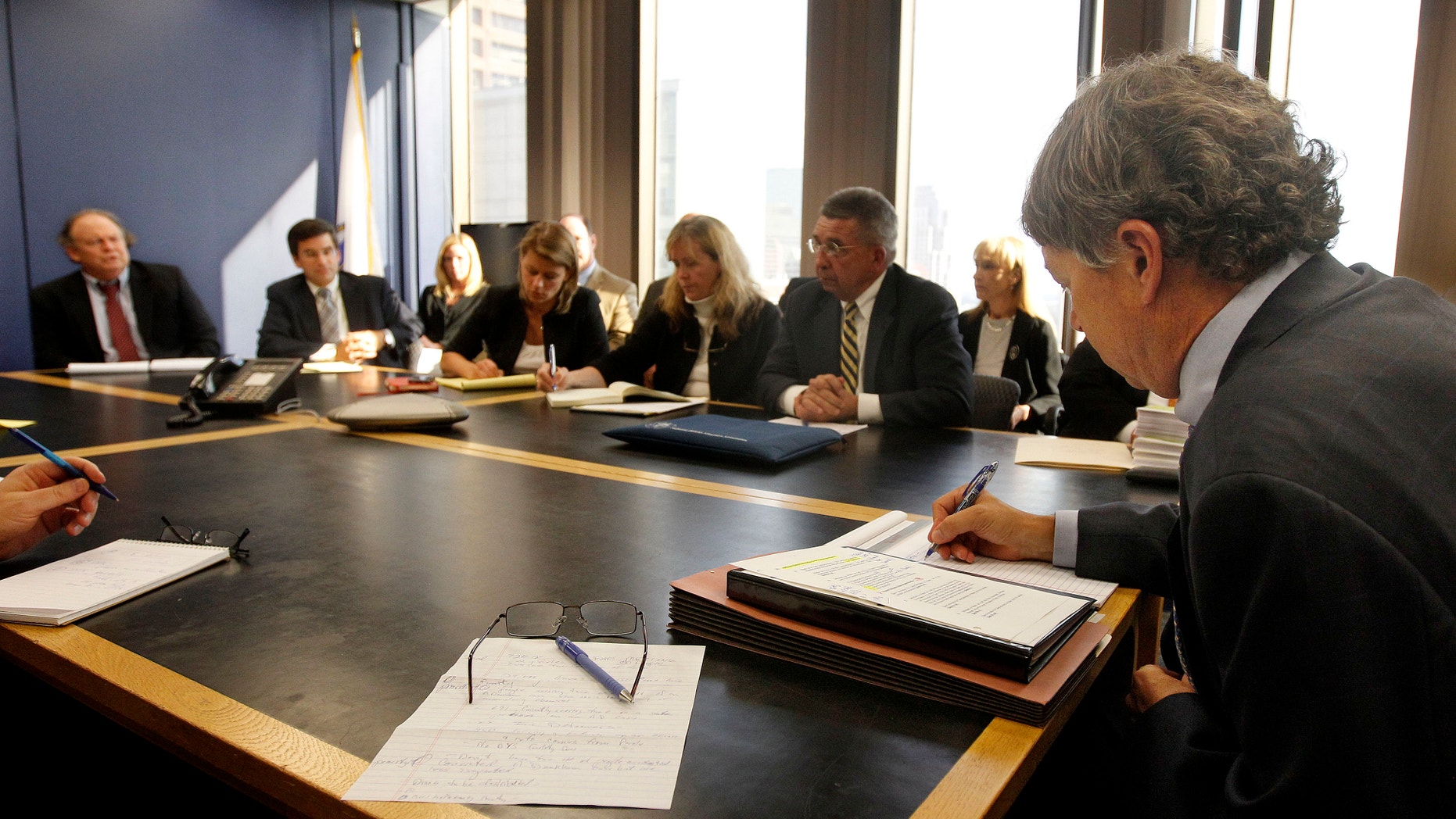 Sept. 24, 2012: David Meier, right, special consul to the Governor appointed to lead the review of drug convictions which might have been compromised by a State Police drug testing lab, leads a meeting at the Department of Public Safety in Boston.