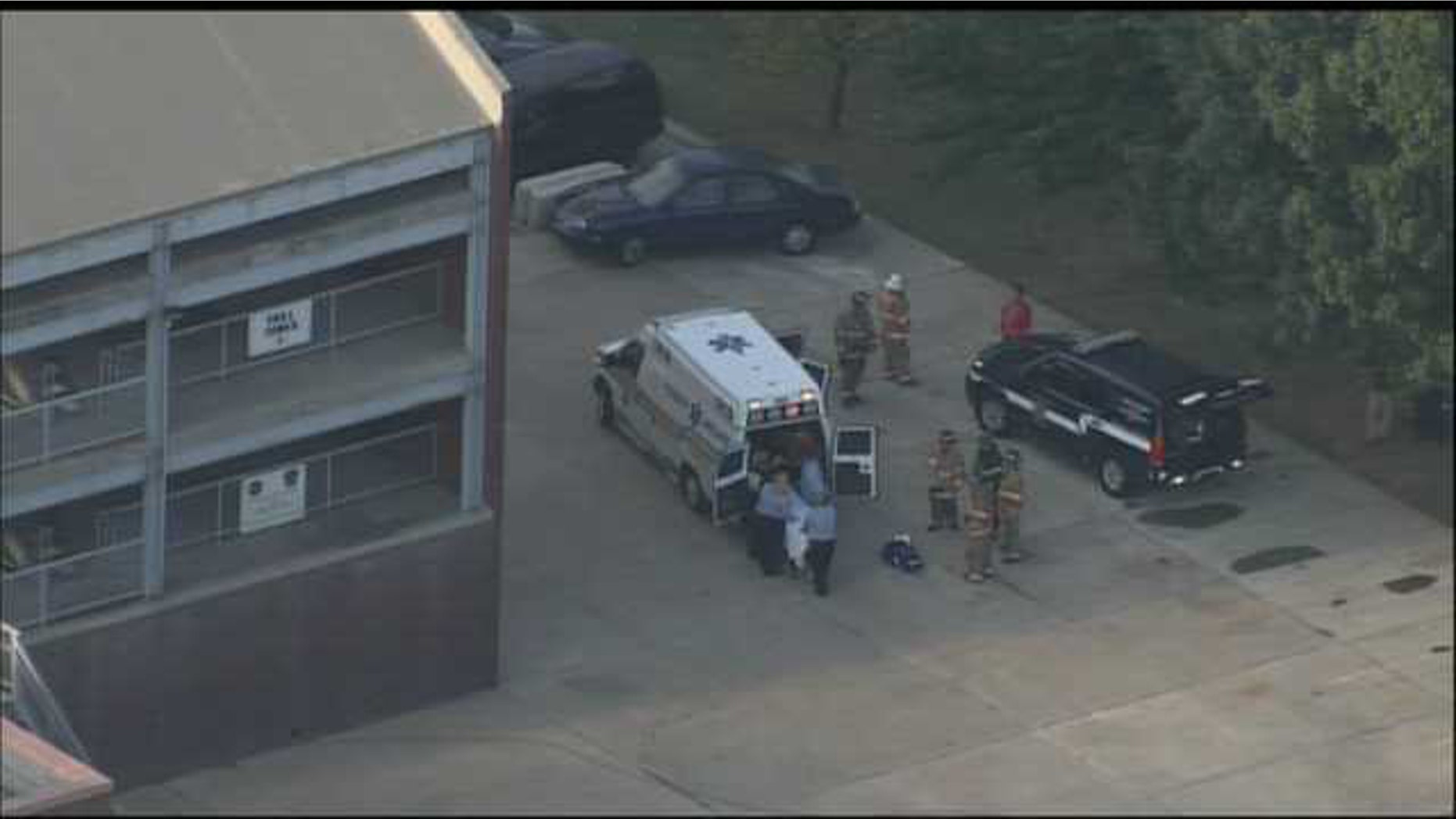 September 30, 2014: An ambulance waits outside the Montgomery County Public Safety Training Complex in Conshohocken, Pa., where a state trooper was fatally shot during a gun training exercise. (WTXF)