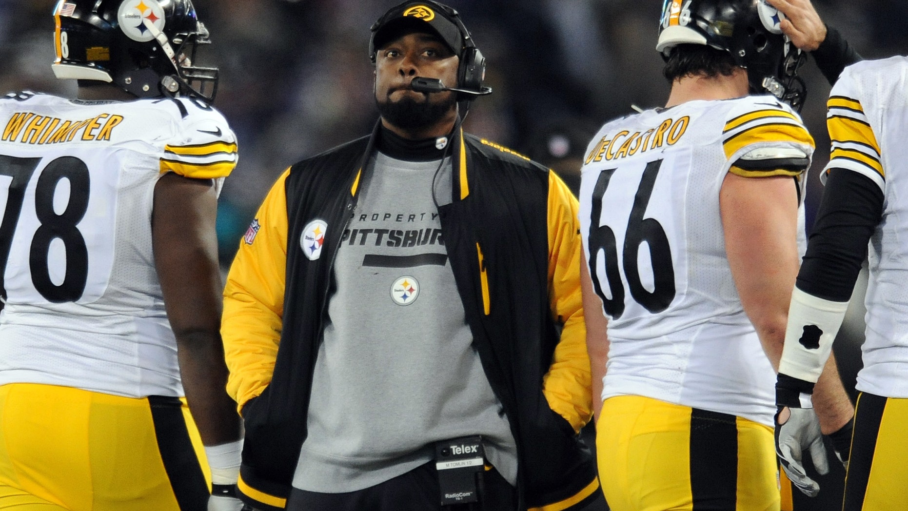 Nov. 28, 2013: In this file photo, Pittsburgh Steelers coach Mike Tomlin stands on the sideline during an official play review in the second half of an NFL football game against the Baltimore Ravens, in Baltimore.