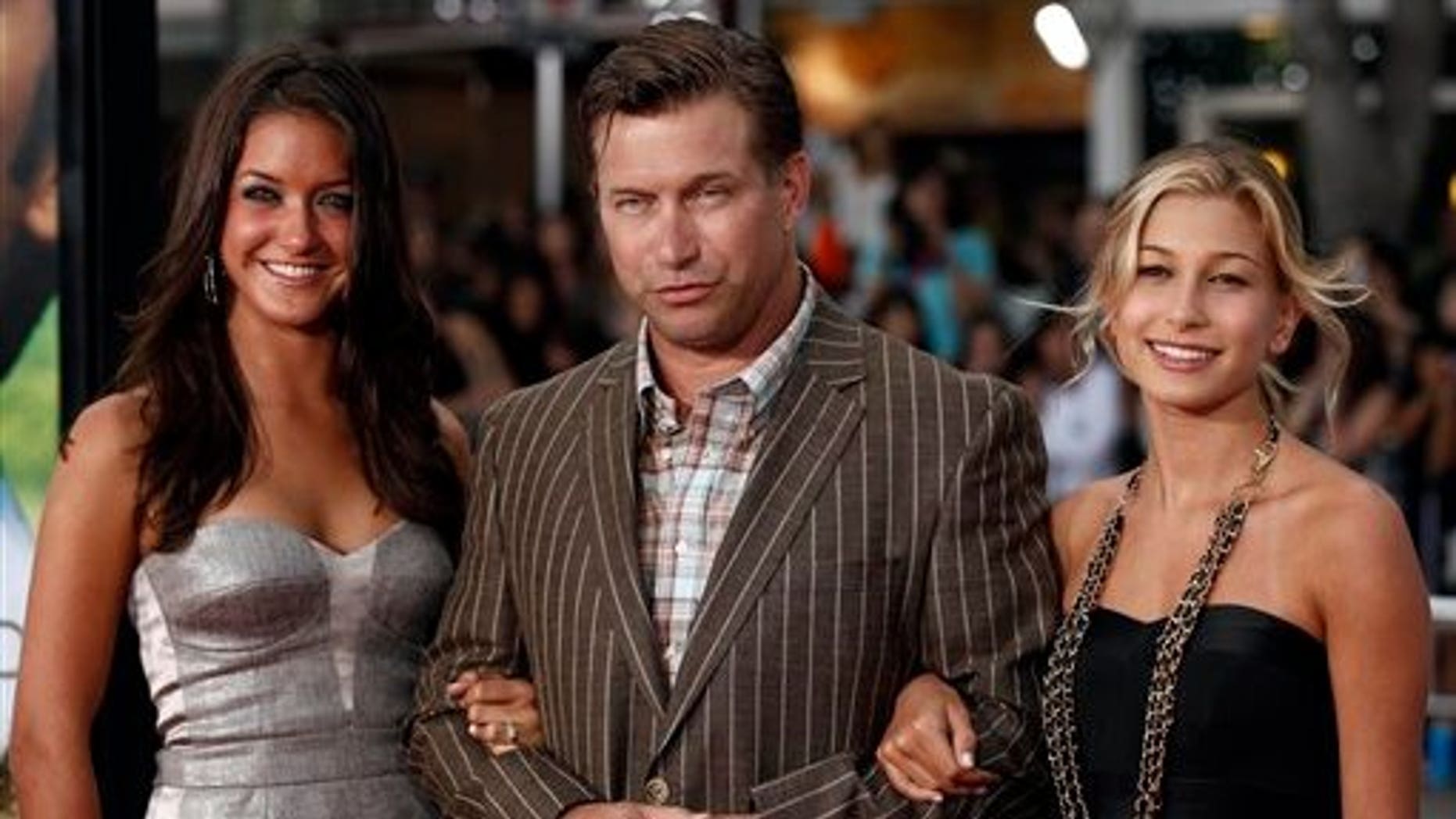 Actor Stephen Baldwin, center, and his daughters Alaia, left, and Hailey arrive at the premiere of "Charlie St. Cloud" in Los Angeles, Tuesday, July 20, 2010. (AP Photo/Matt Sayles)