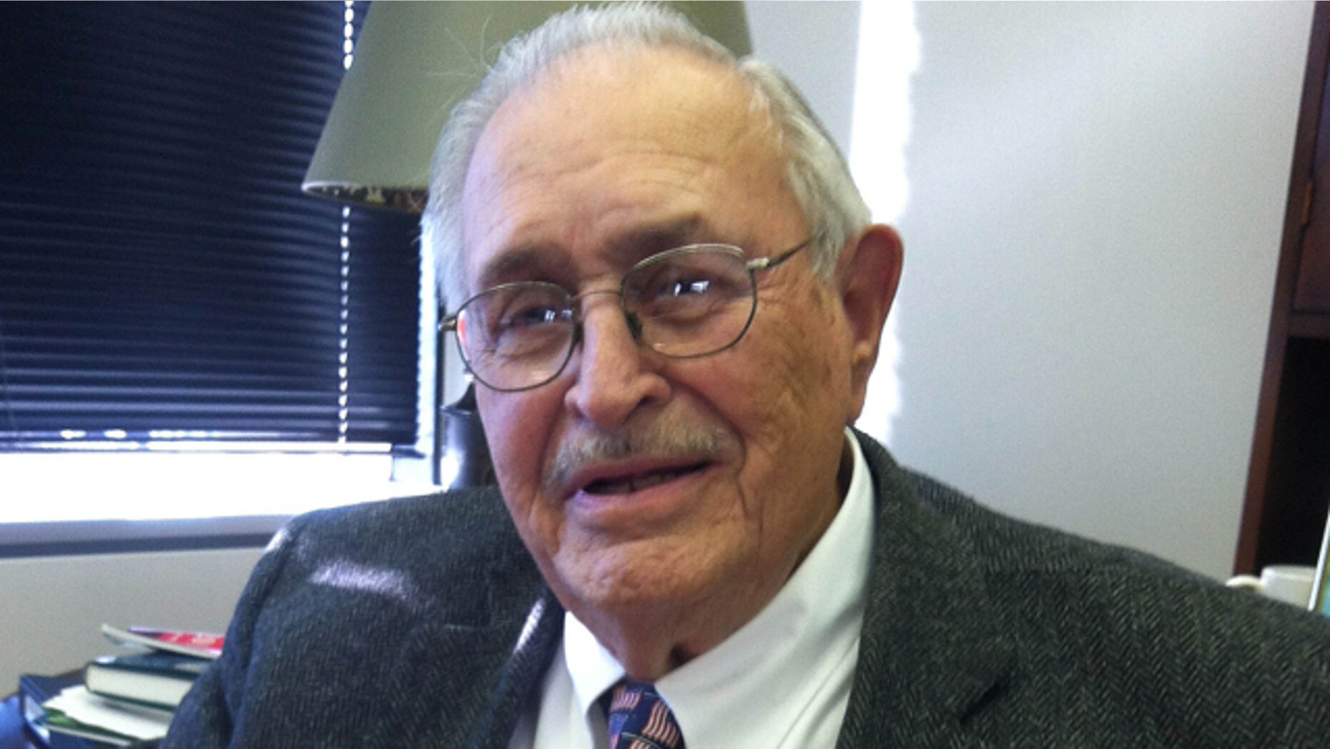 Lewis Reynolds, 85, was involuntarily sterilized at age 13 under a Virginia state law intended to prevent 'defective' people from reproducing. He went on to serve 30 years in the Marine Corps. Reynolds didn't know what had been done to him until years later. (AP Photo/The Virginian-Pilot, Bill Sizemore)