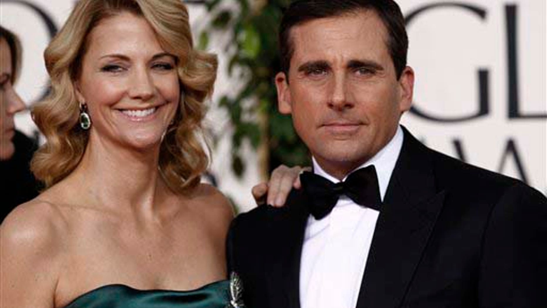 Steve Carell arrives with his wife Nancy Carell for the Golden Globe Awards Sunday, Jan. 16, 2011, in Beverly Hills, Calif. (AP Photo/Matt Sayles)