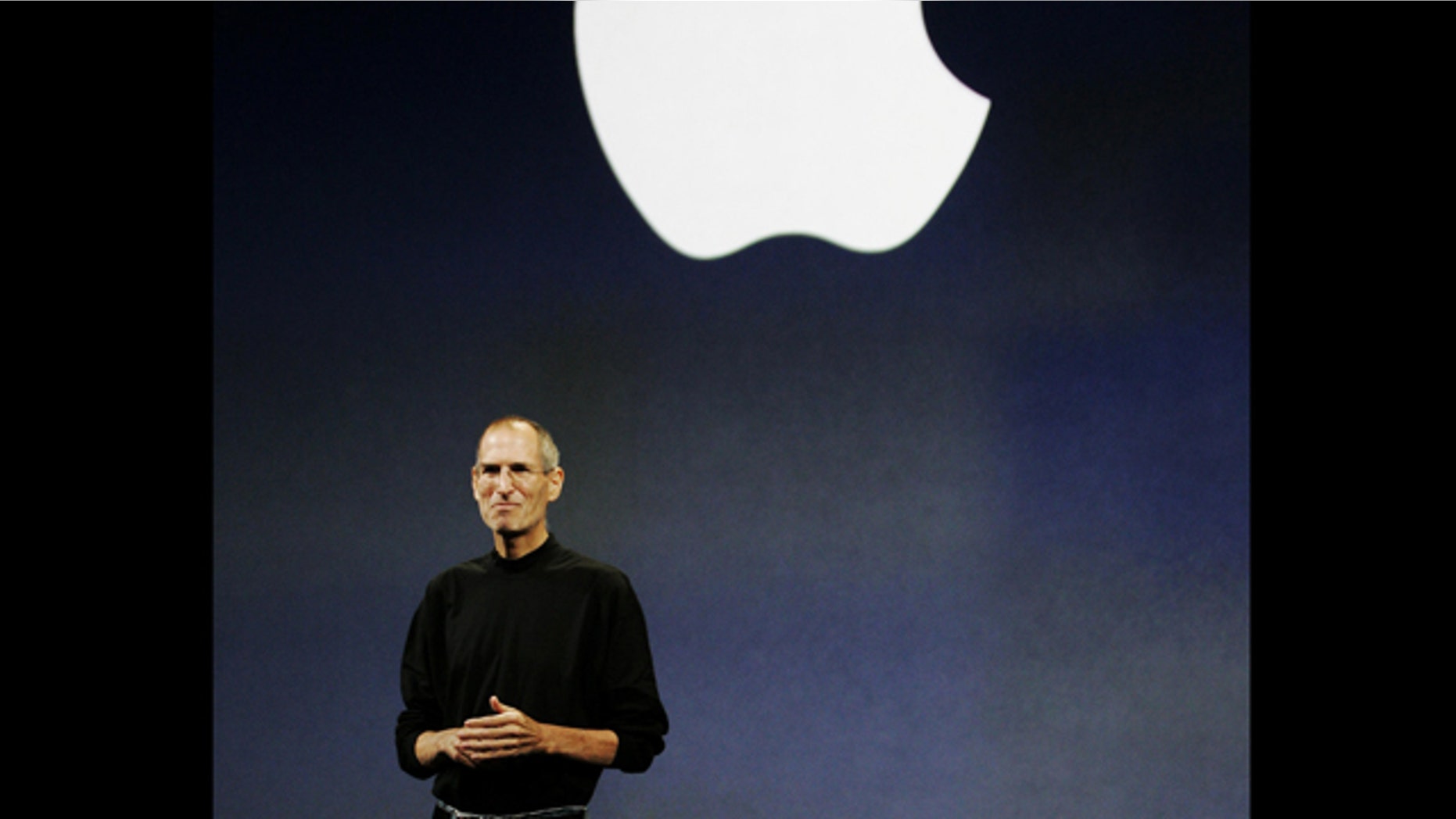 FILE - In this Sept. 9, 2009 file photo, Apple CEO Steve Jobs is seen during an Apple event in San Francisco. Apple's new touch-screen "tablet" computer, expected to be unveiled Wednesday, Jan. 27, 2010, could give publishers the alternative to Amazon.com they have been craving and give consumers a new way to think about reading books without paper. (AP Photo/Paul Sakuma, File)