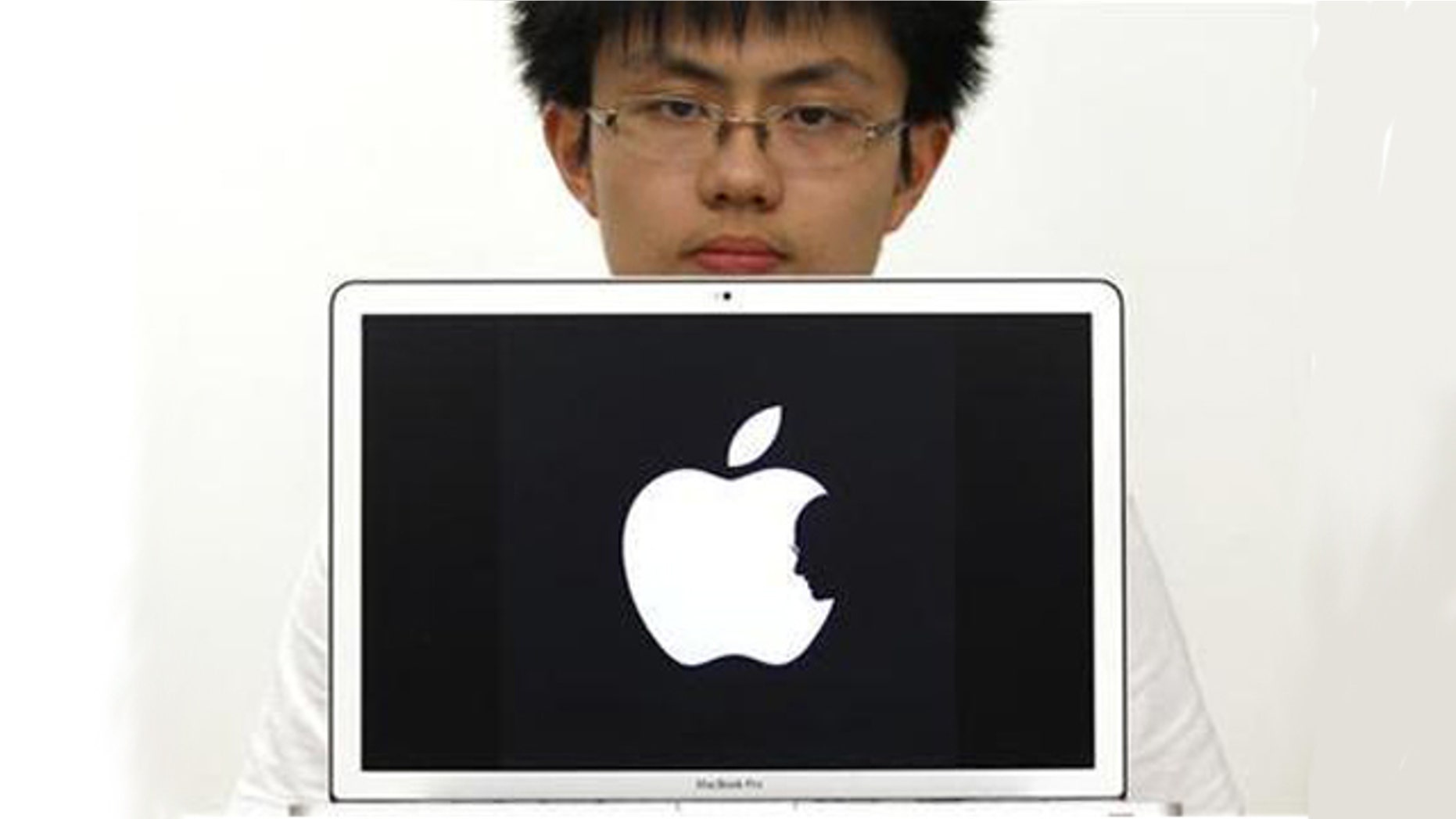 Hong Kong design student Jonathan Mak is seen in Hong Kong in this October 6, 2011 file photo. Mak's tribute to Steve Jobs that generated a buzz in cyberspace following the death of the co-founder of Apple last week is not original, the teenager said on Monday.