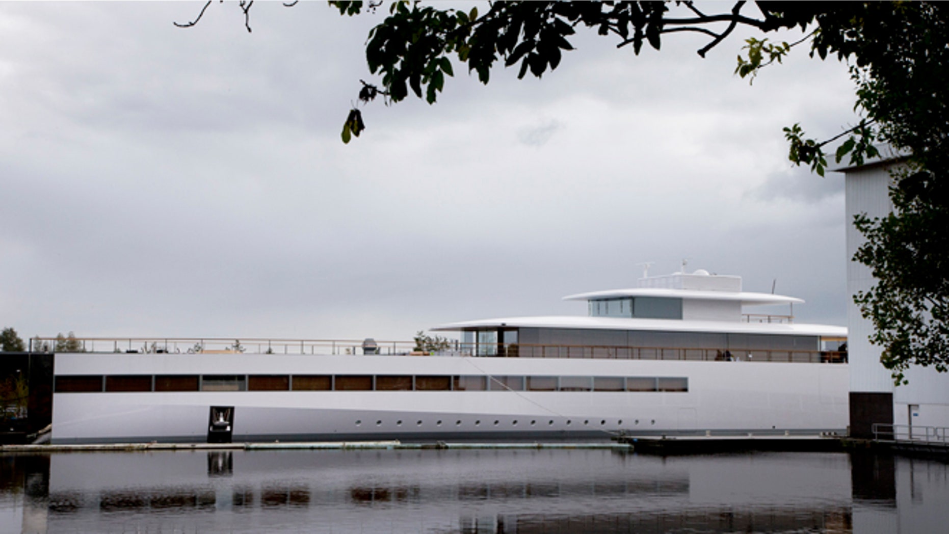 The sleek, white superyacht Apple founder Steve Jobs commissioned before his death cannot leave the Netherlands just yet due to a payment dispute. Dutch newspaper Het Financieele Dagblad reported Friday Dec. 21, 2012 that Starck hired a debt collection agency and got a summary legal order to keep the boat from leaving.