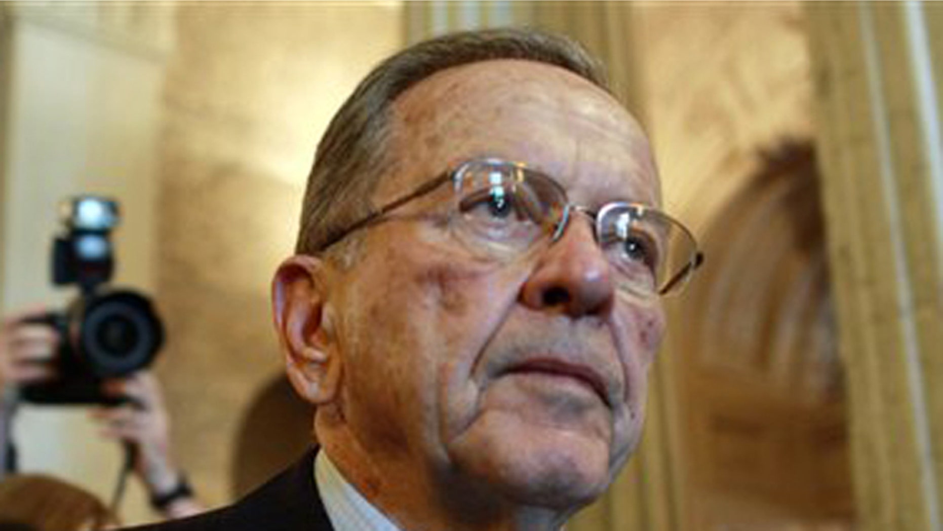 FILE: Nov. 29, 2008. Then-Sen. Ted Stevens, R-Alaska, leaves the Senate chamber after making his last formal speech on the chamber floor.