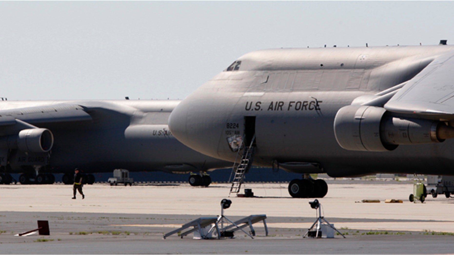 U.S. Air National Guard C-5 jets sit on the tarmac at Stewart Air National Guard Base in Newburgh, New York, May 21, 2009. The FBI and New York police arrested four Muslim men in Newburgh on Wednesday night after they planted what they believed to be explosives in two cars -- one parked outside each synagogue -- and planned to head to Stewart Air base with what they thought was an activated stinger surface-to-air missile. REUTERS/Mike Segar (UNITED STATES CRIME LAW MILITARY RELIGION TRANSPORT)