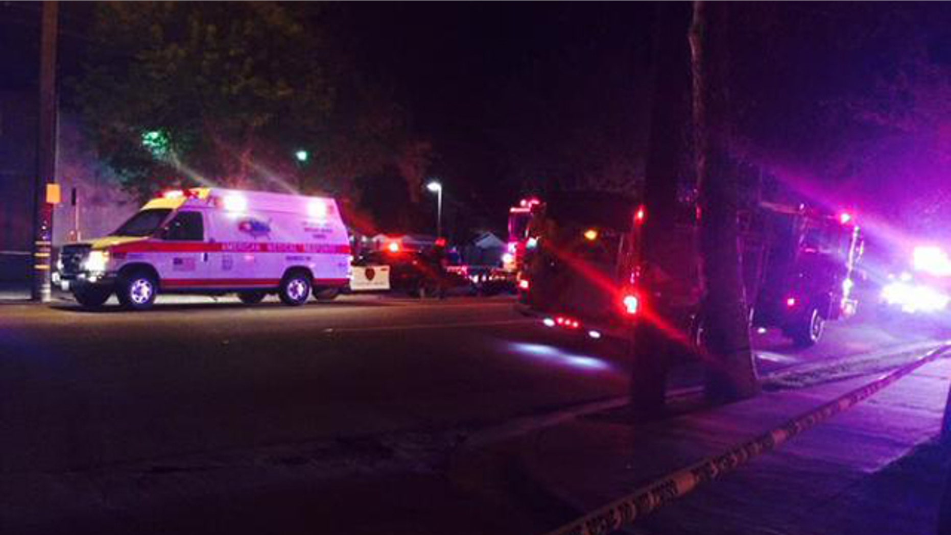 March 17, 2015: An ambulance responds to a shooting at a grocery store that killed three people and wounded four others in Stockton, Calif. Authorities said the shooting was a drive-by. (Photo courtesy Tia A. Ewing/Fox40)