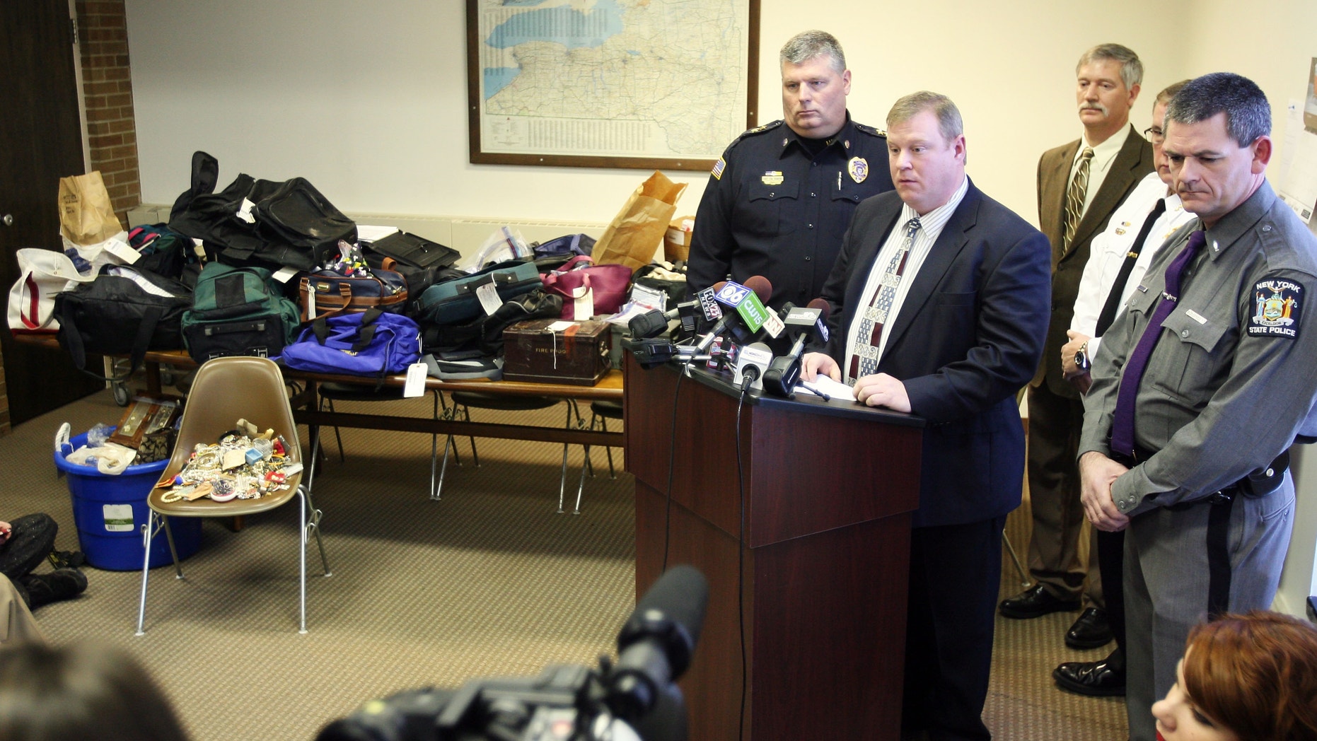 Jan. 2, 2013 : Hudson Falls Police Detective Scott Gillis talks to the media about evidence seized from a years-long burglary spree during a news conference.