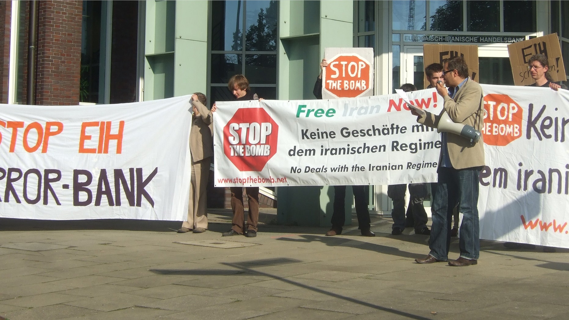 The activist group Stop the Bomb protests EIH 'terror bank.'