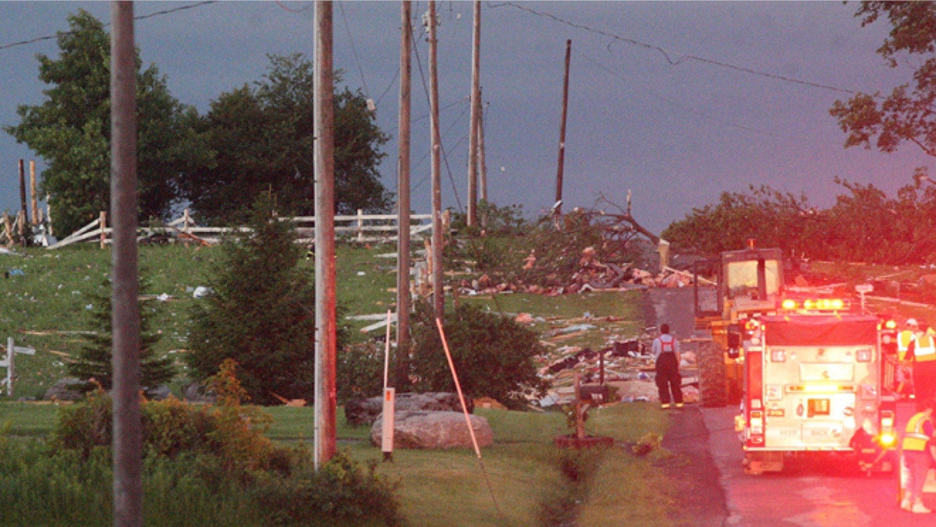 July 8: Debris is visible at Goff Road in Smithfield, N.Y., following a severe storm.