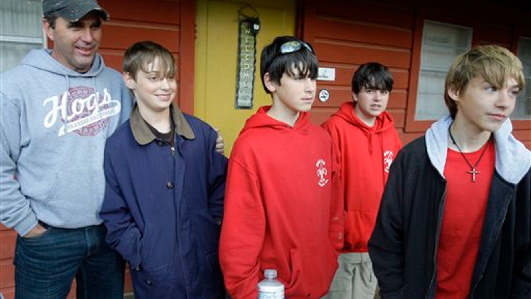 May 3: Louisiana Boy Scouts who were rescued reunited with their families in Langley, Arkansas.